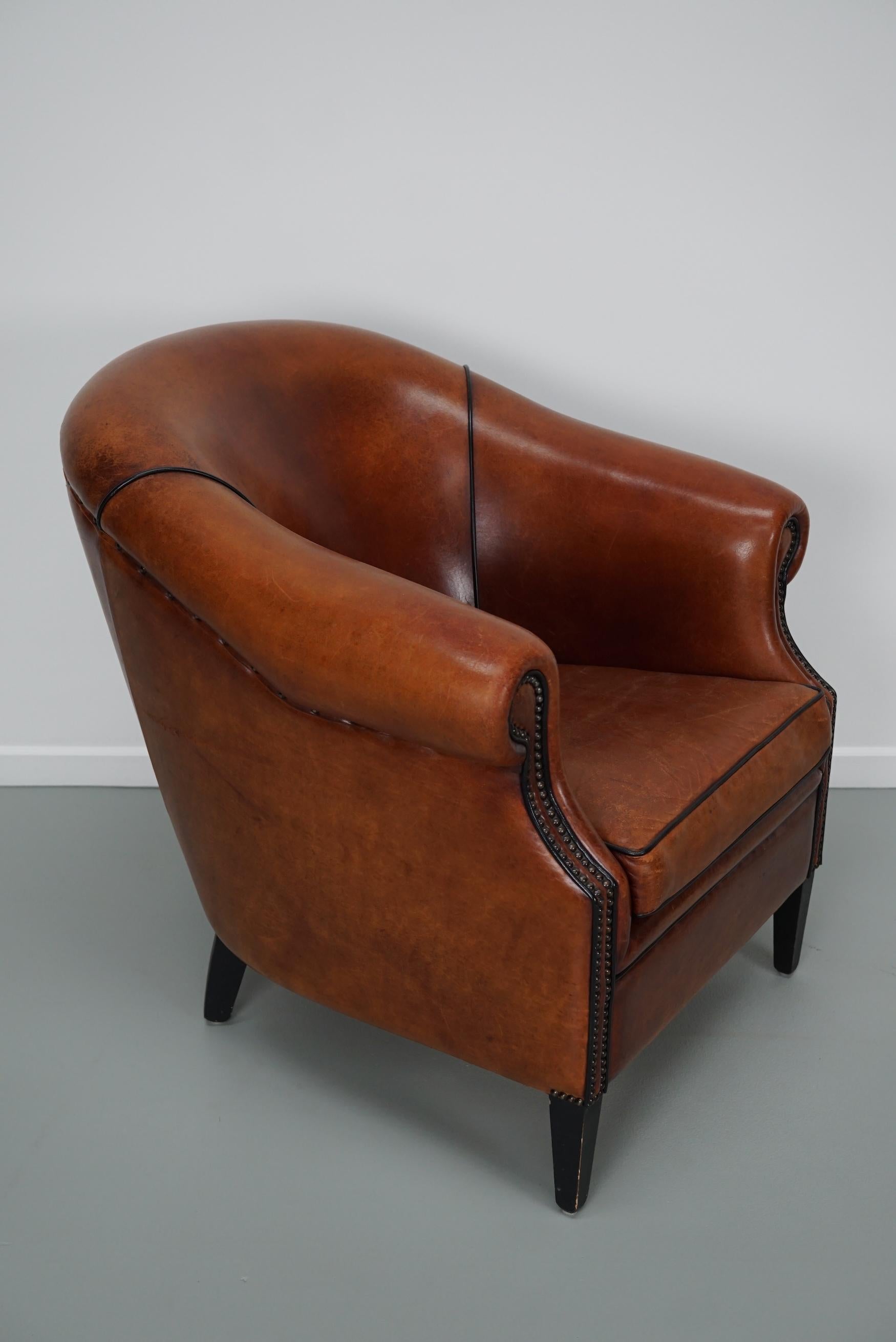 Cognacfarbener Clubsessel aus Leder im Angebot 3