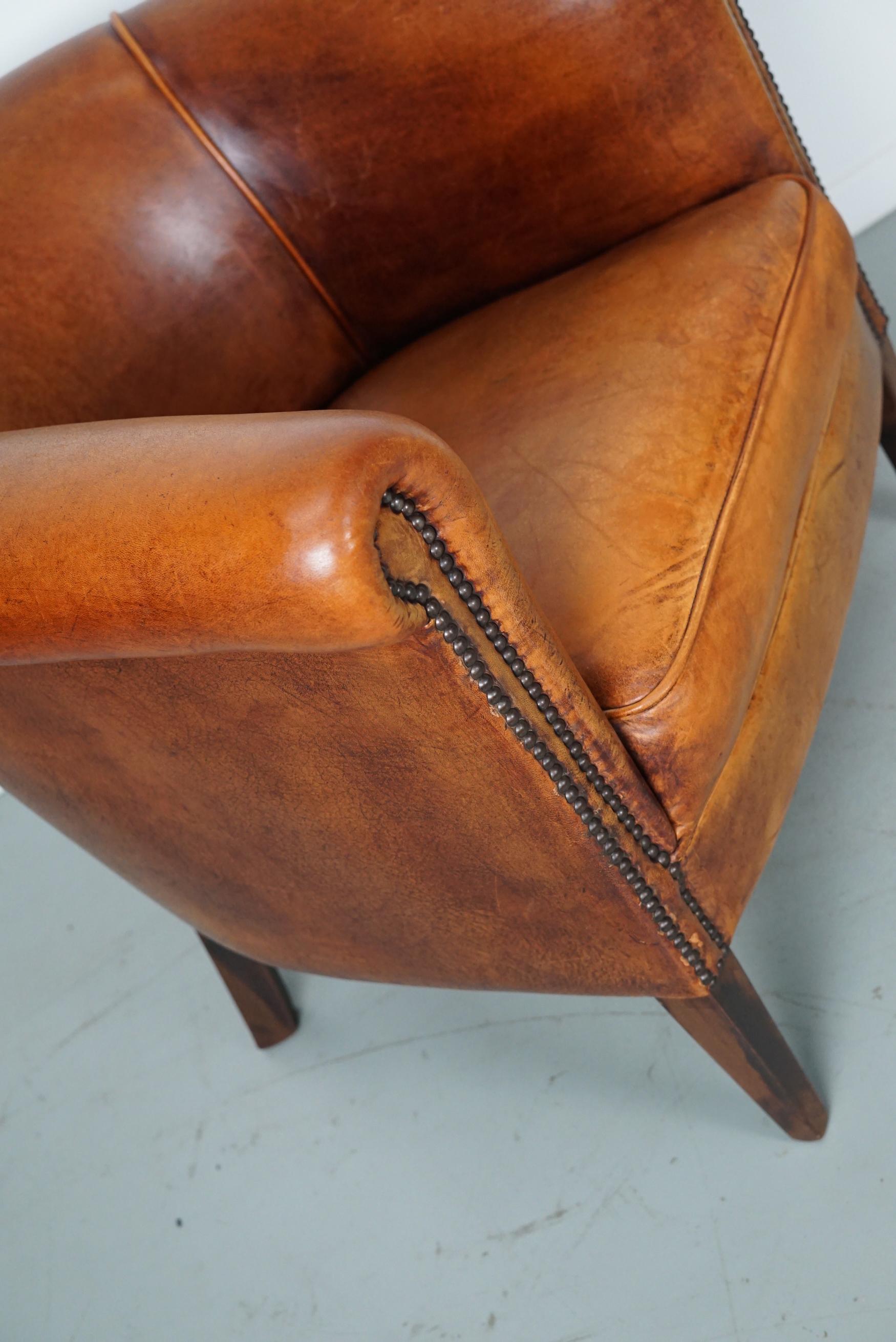 Cognacfarbener Clubsessel aus Leder im Angebot 4
