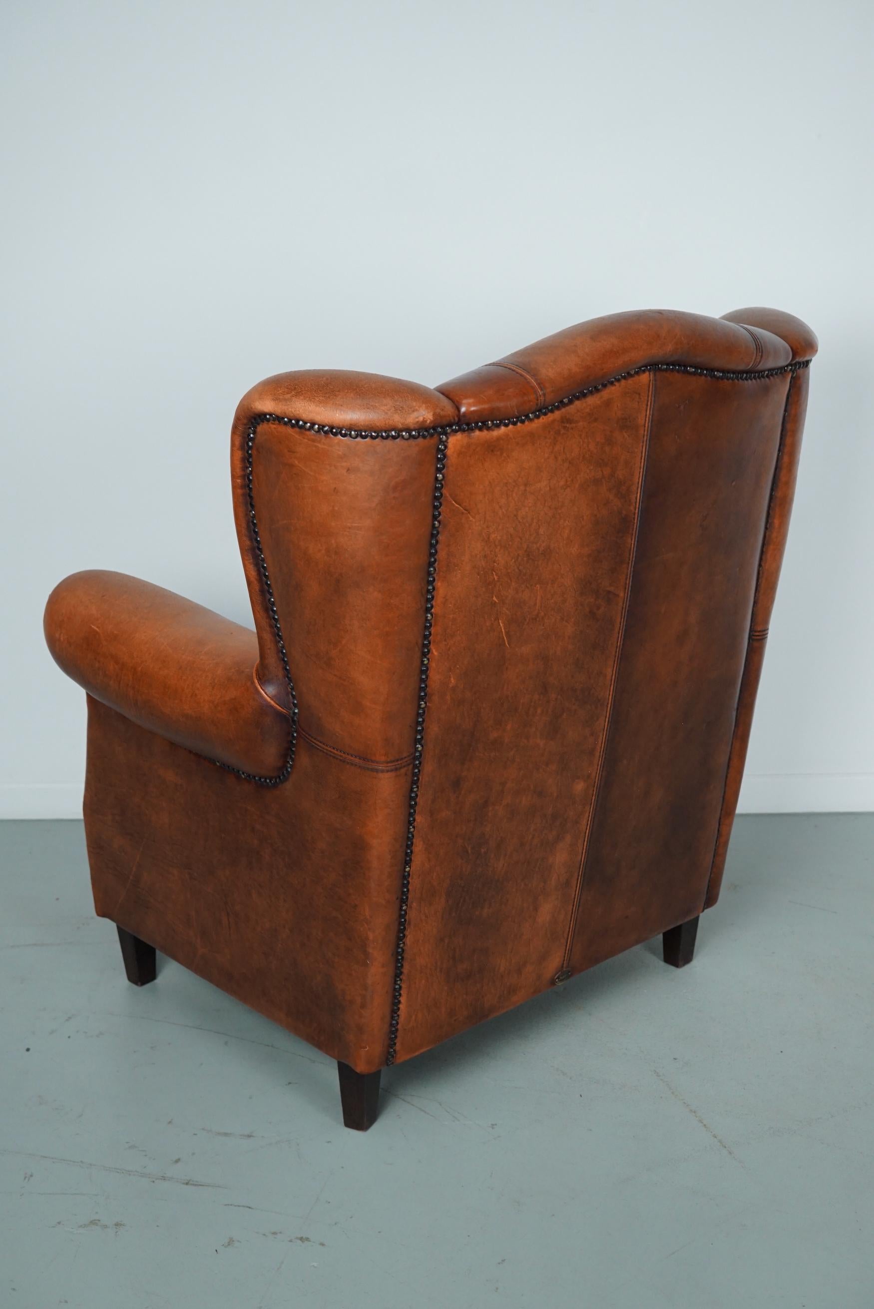 Cognacfarbener Clubsessel aus Leder im Angebot 4