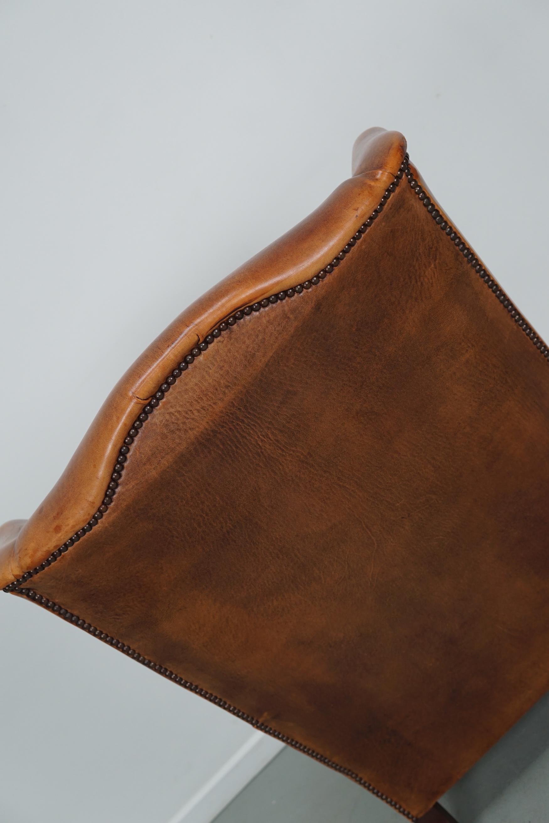 Cognacfarbener Clubsessel aus Leder im Angebot 4
