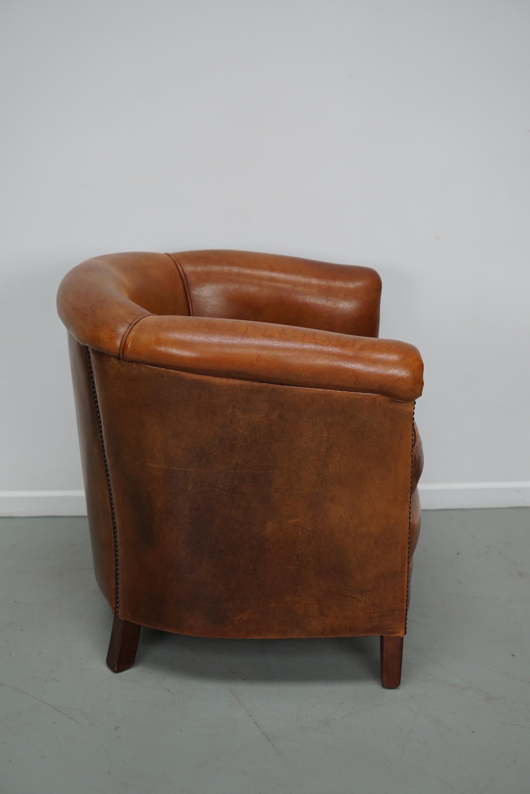 Cognacfarbener Clubsessel aus Leder im Angebot 4