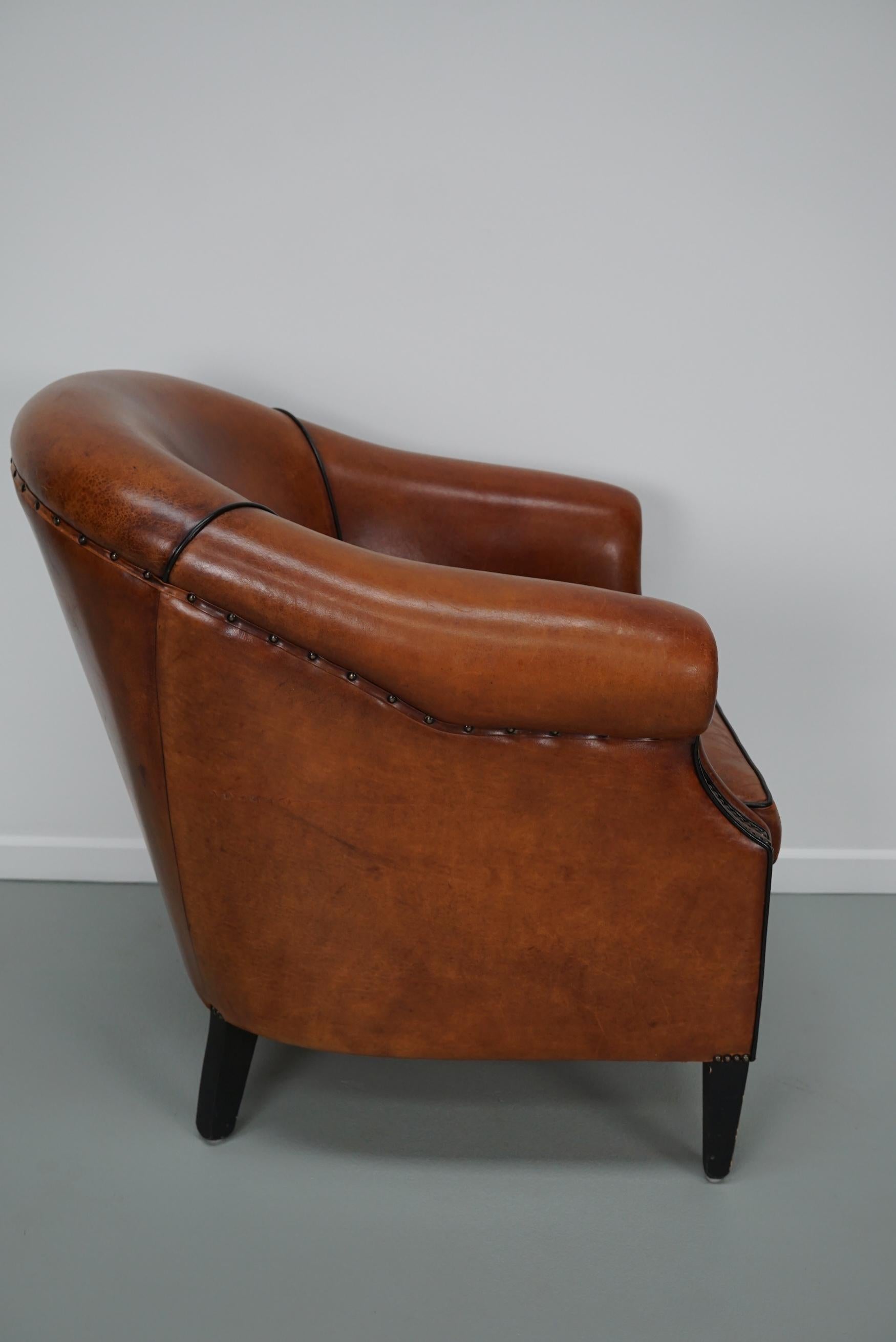 Cognacfarbener Clubsessel aus Leder im Angebot 4