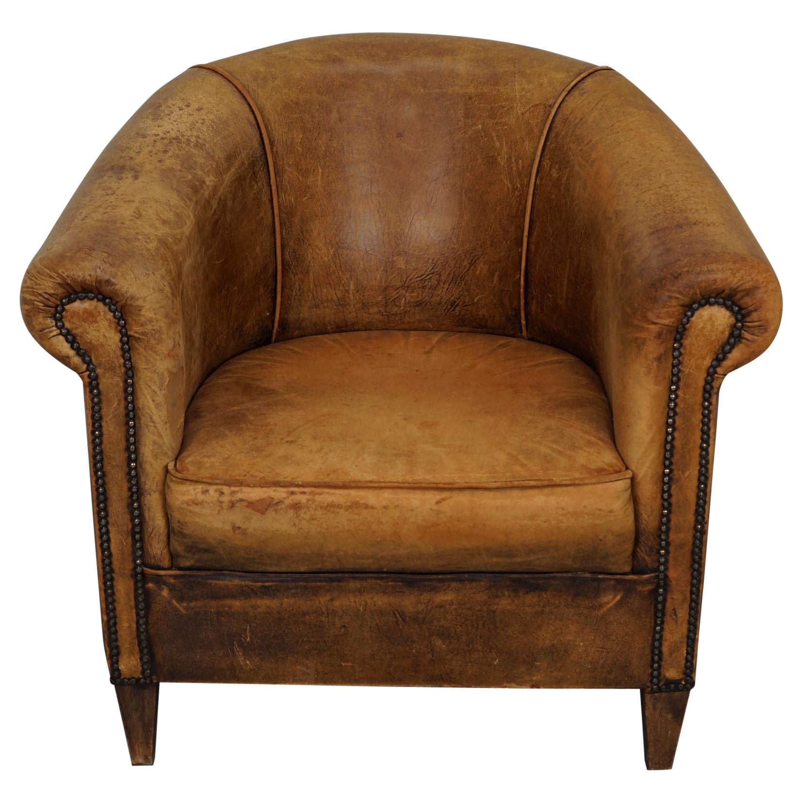 Cognacfarbener Clubsessel aus Leder