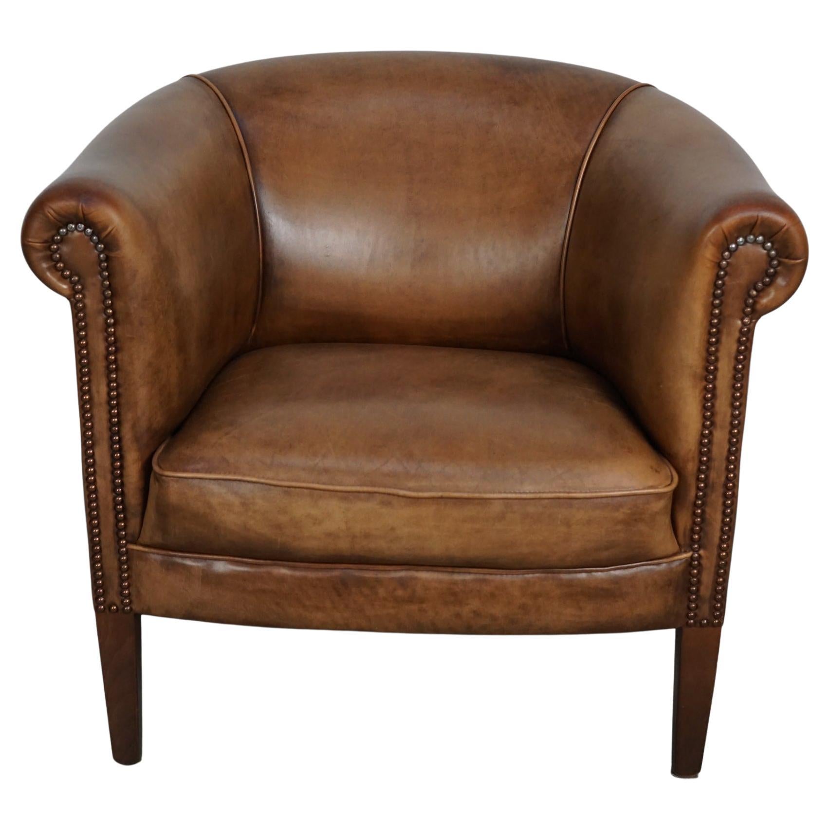 Cognacfarbener Clubsessel aus Leder