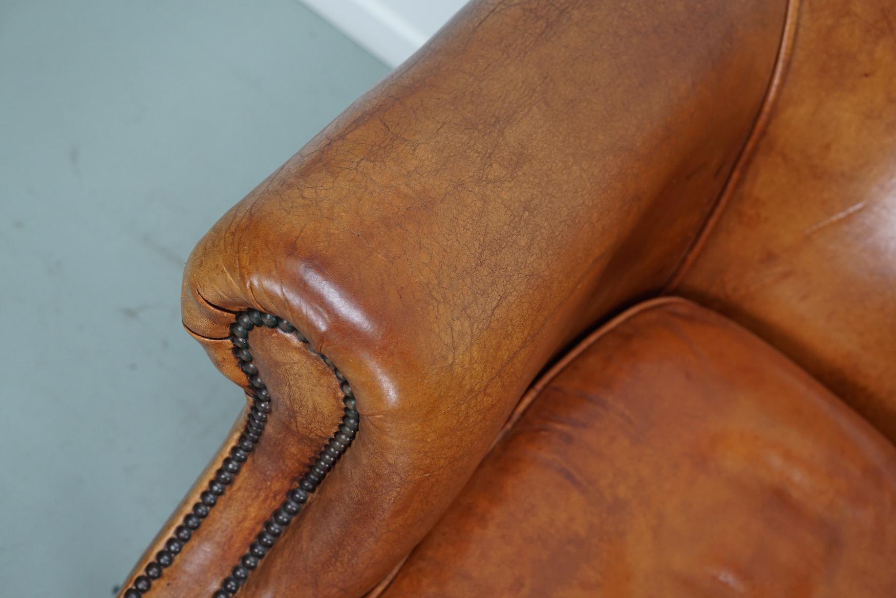 Cuir Fauteuil club néerlandais vintage en cuir de couleur cognac, lot de 2