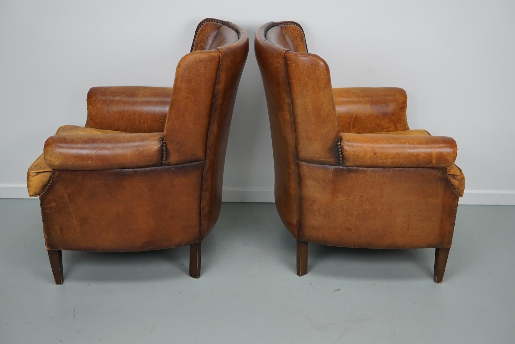 Vintage Dutch Cognac Colored Leather Club Chair, Set of 2 with Footstool 1
