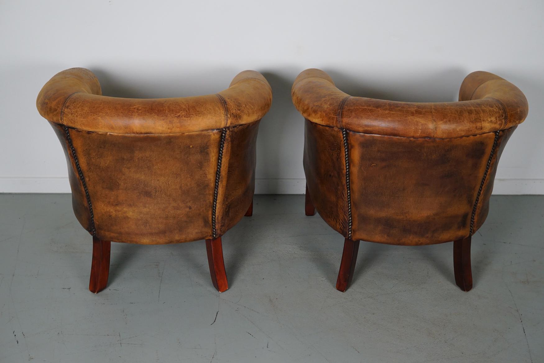 Late 20th Century Vintage Dutch Cognac Colored Leather Club Chair, Set of 2 with Footstools For Sale