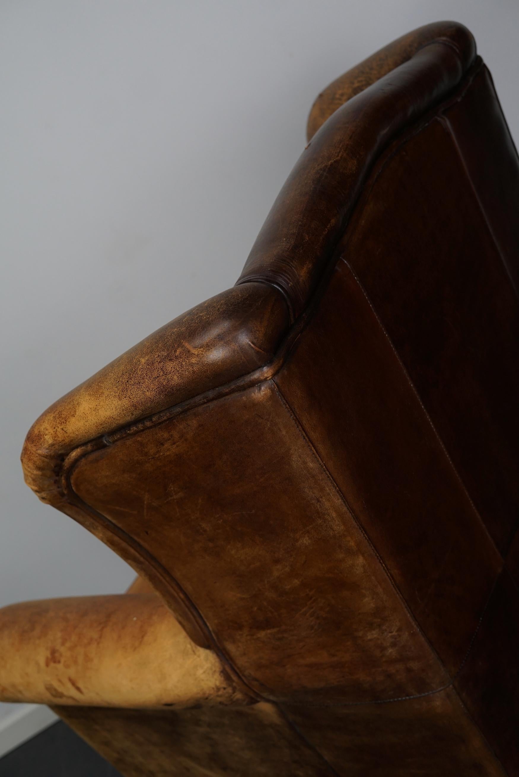 Vintage Dutch Cognac Colored Wingback Leather Club Chair In Good Condition For Sale In Nijmegen, NL