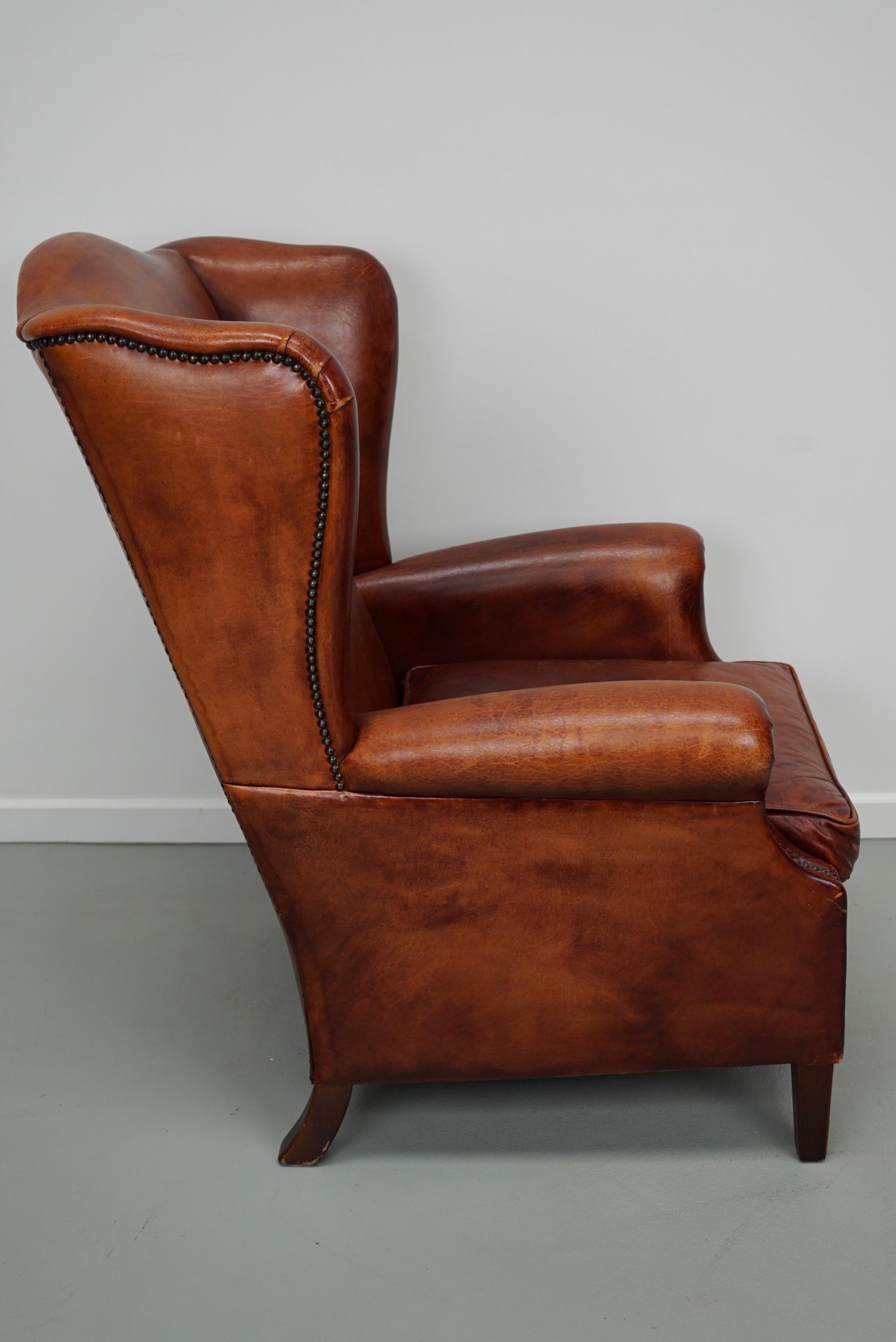  Vintage Dutch Cognac Colored Wingback Leather Club Chair In Good Condition For Sale In Nijmegen, NL