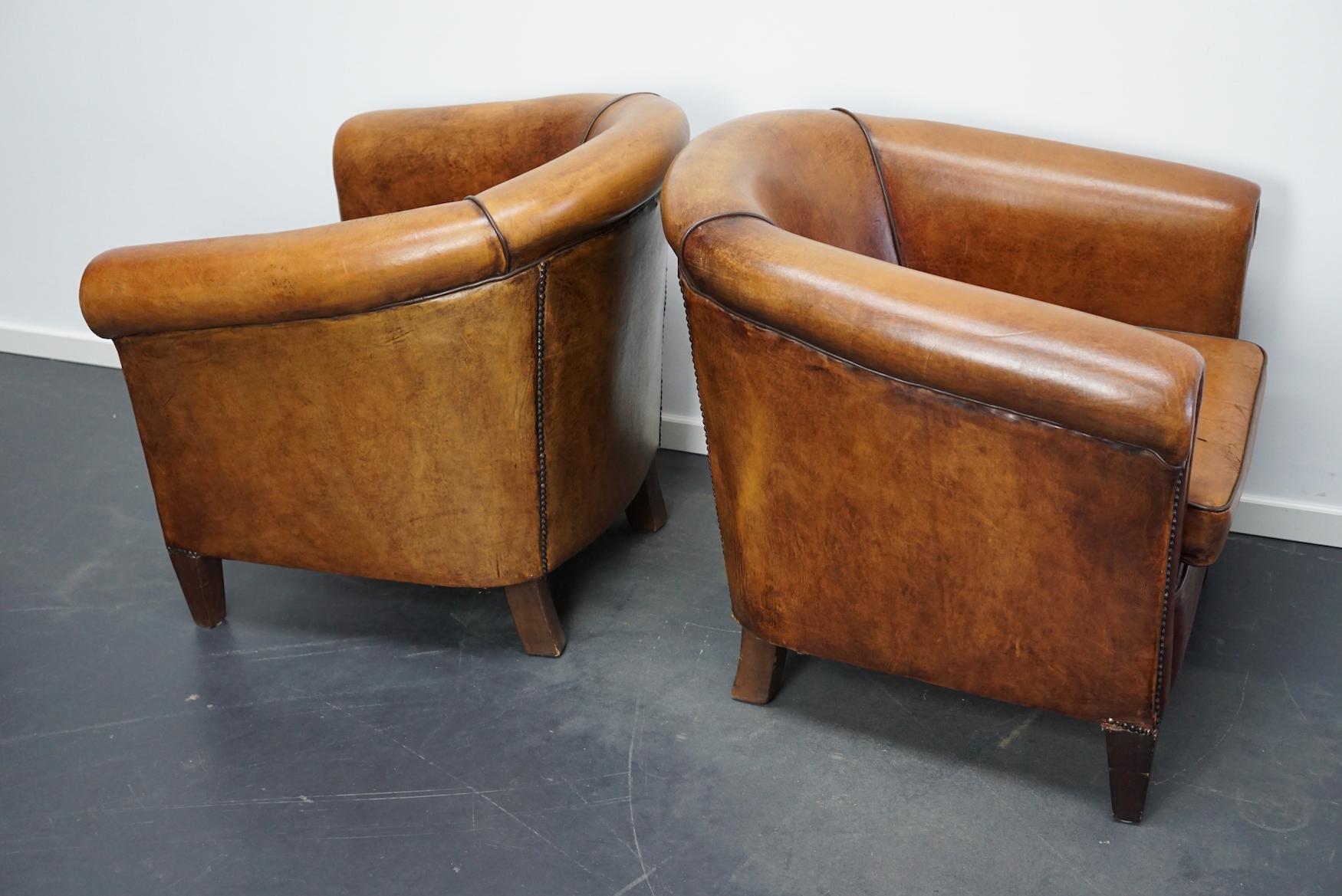 leather chairs with footstool