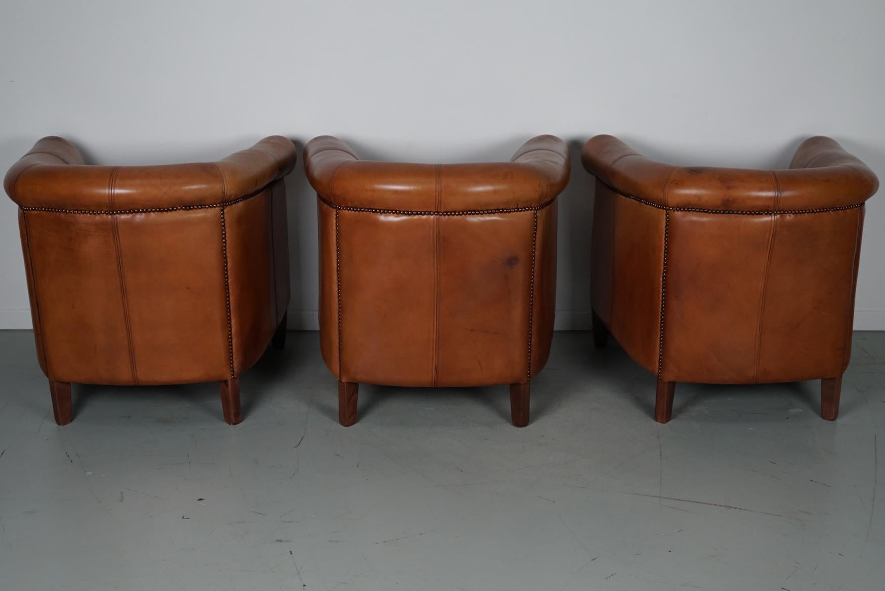  Vintage Dutch Cognac Leather Club Chairs, Set of Three with Two Footstools For Sale 5