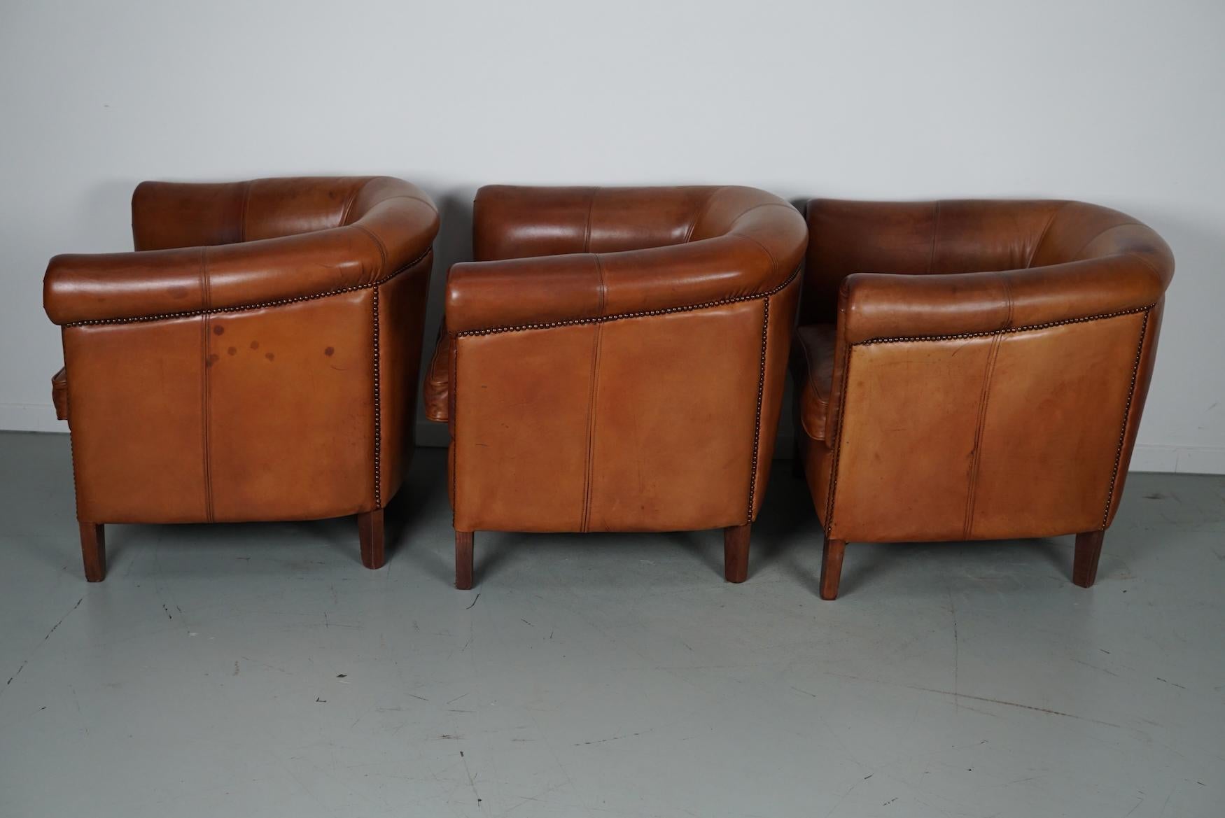  Vintage Dutch Cognac Leather Club Chairs, Set of Three with Two Footstools For Sale 9