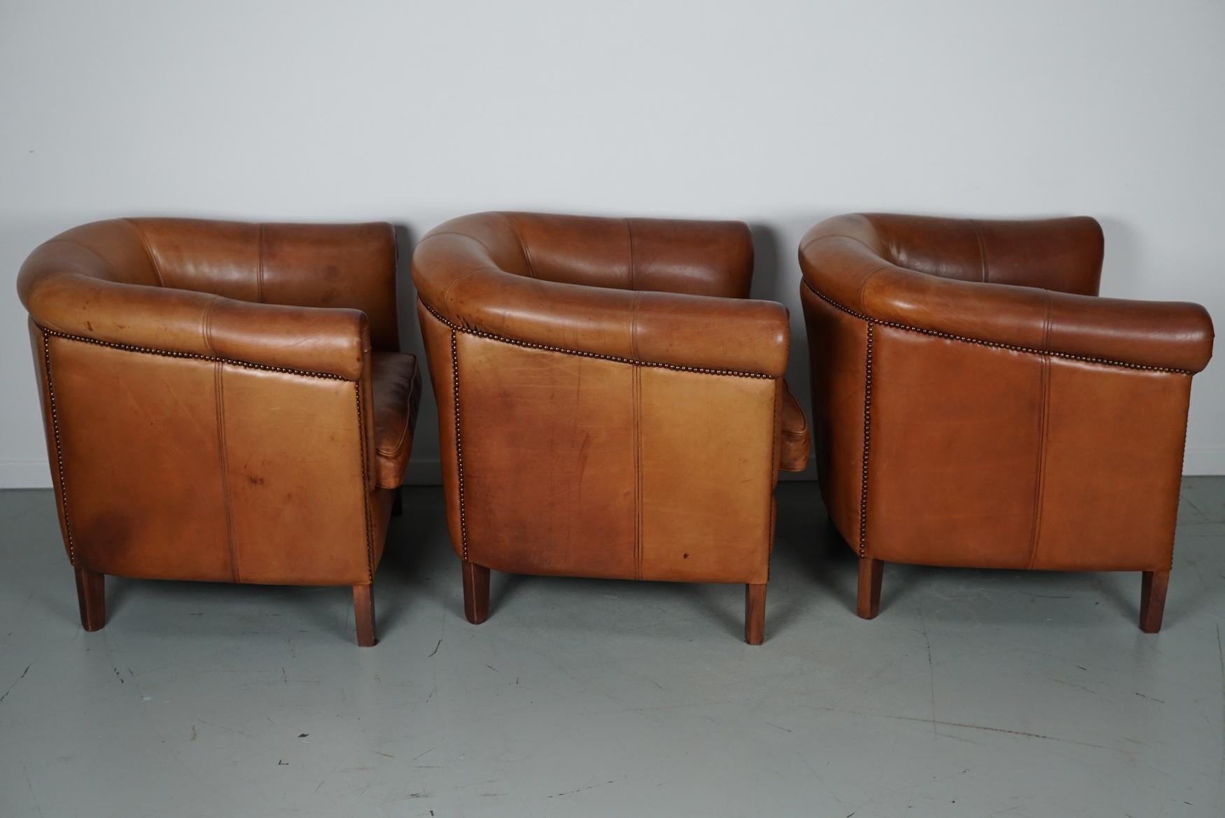  Vintage Dutch Cognac Leather Club Chairs, Set of Three with Two Footstools For Sale 12