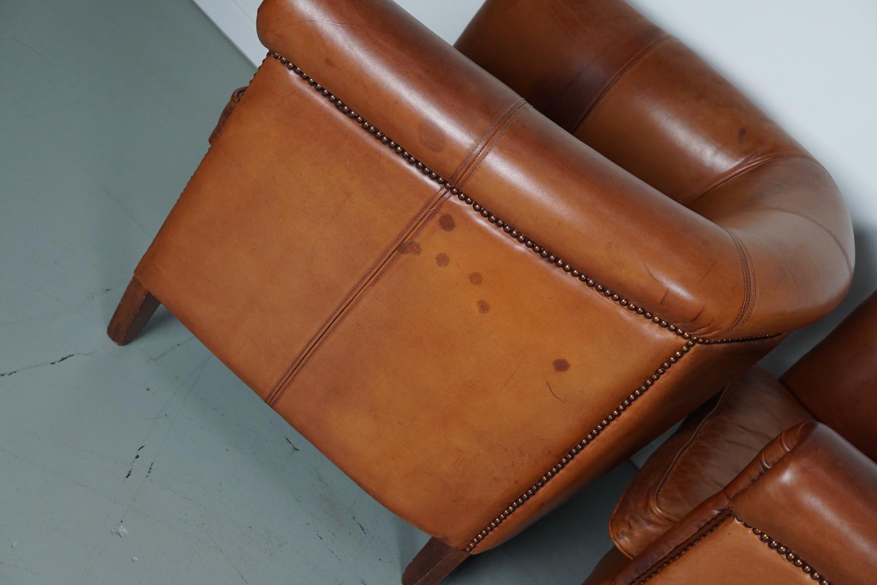  Vintage Dutch Cognac Leather Club Chairs, Set of Three with Two Footstools For Sale 1