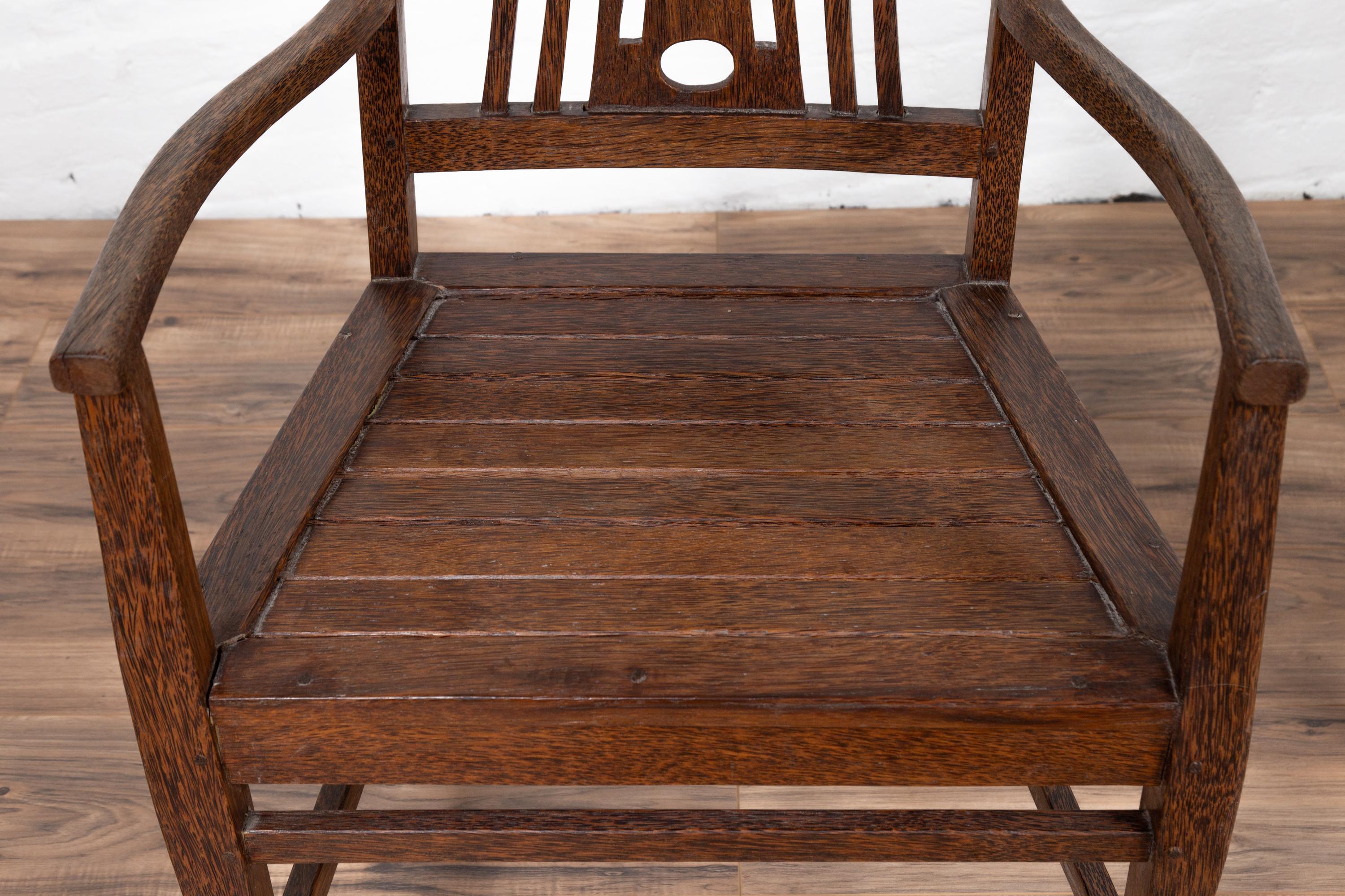 high back wooden armchair