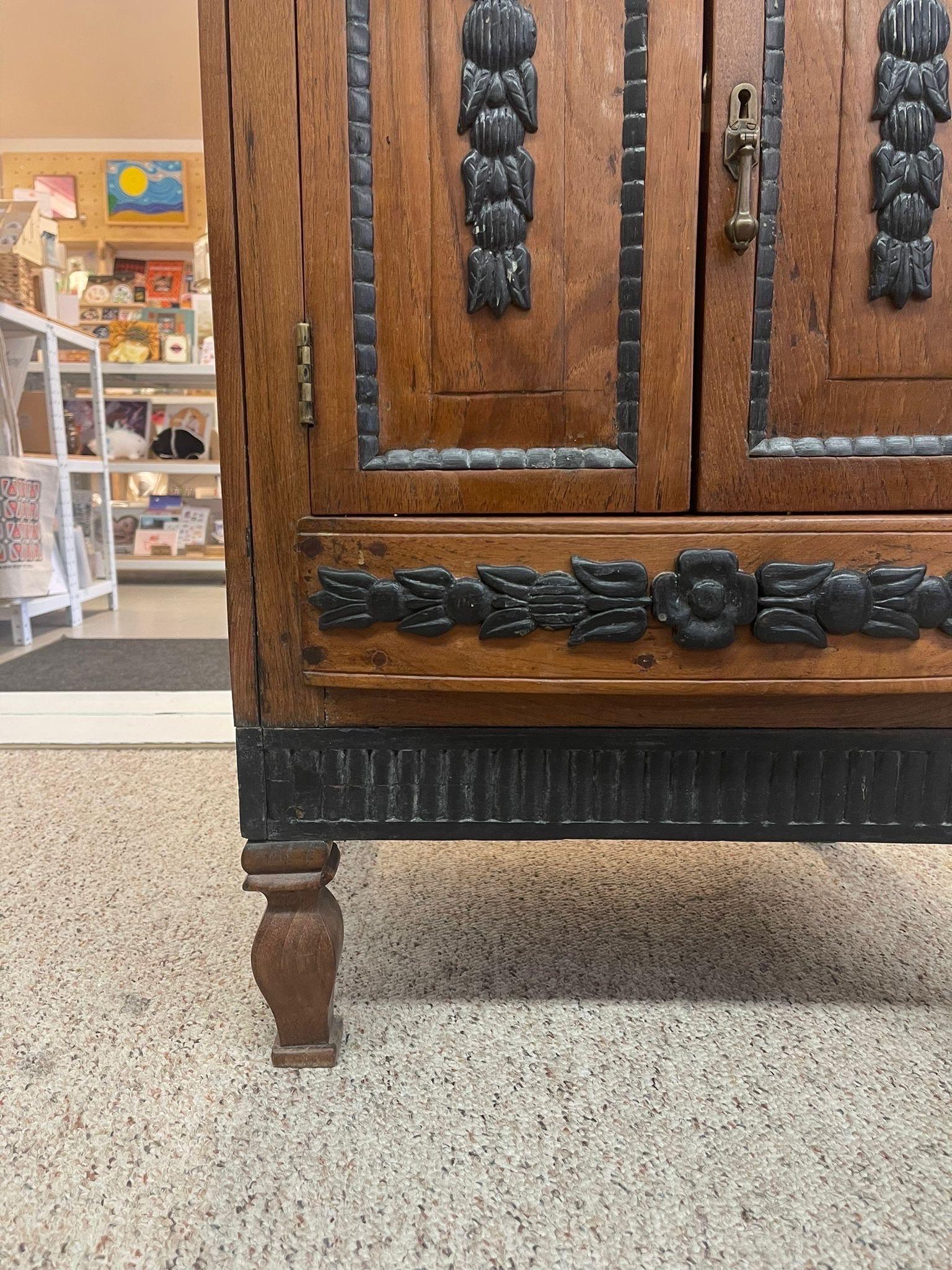 Late 20th Century Vintage Dutch Colonial Style Cabinet With Carved Wood Accents. For Sale