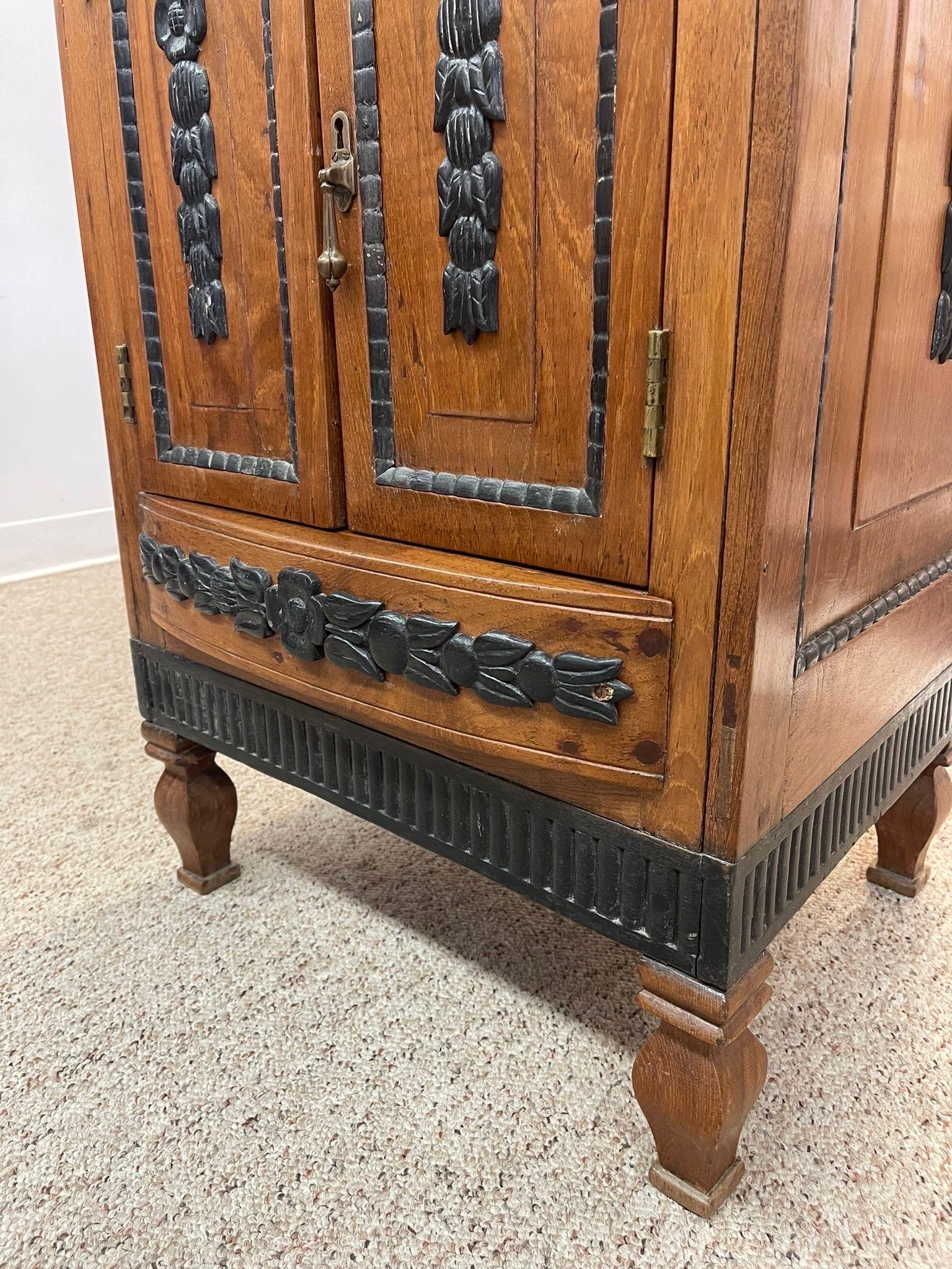Vintage Dutch Colonial Style Cabinet With Carved Wood Accents. For Sale 1