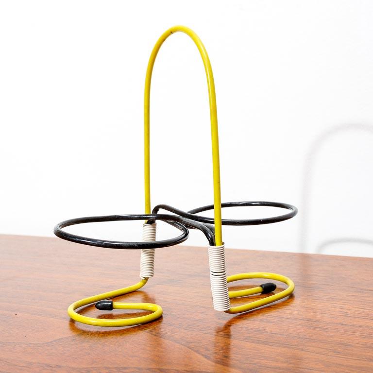 Vintage Dutch condiment holder, perfect for you oil and vinegar. Black and yellow steel rod with faux-rattan wraps.