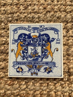 Vintage Dutch Delft Blue and White Tile Featuring a Heraldic Coat of Arms