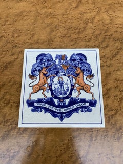 Vintage Dutch Delft Blue and White Tile Featuring a Heraldic Coat of Arms