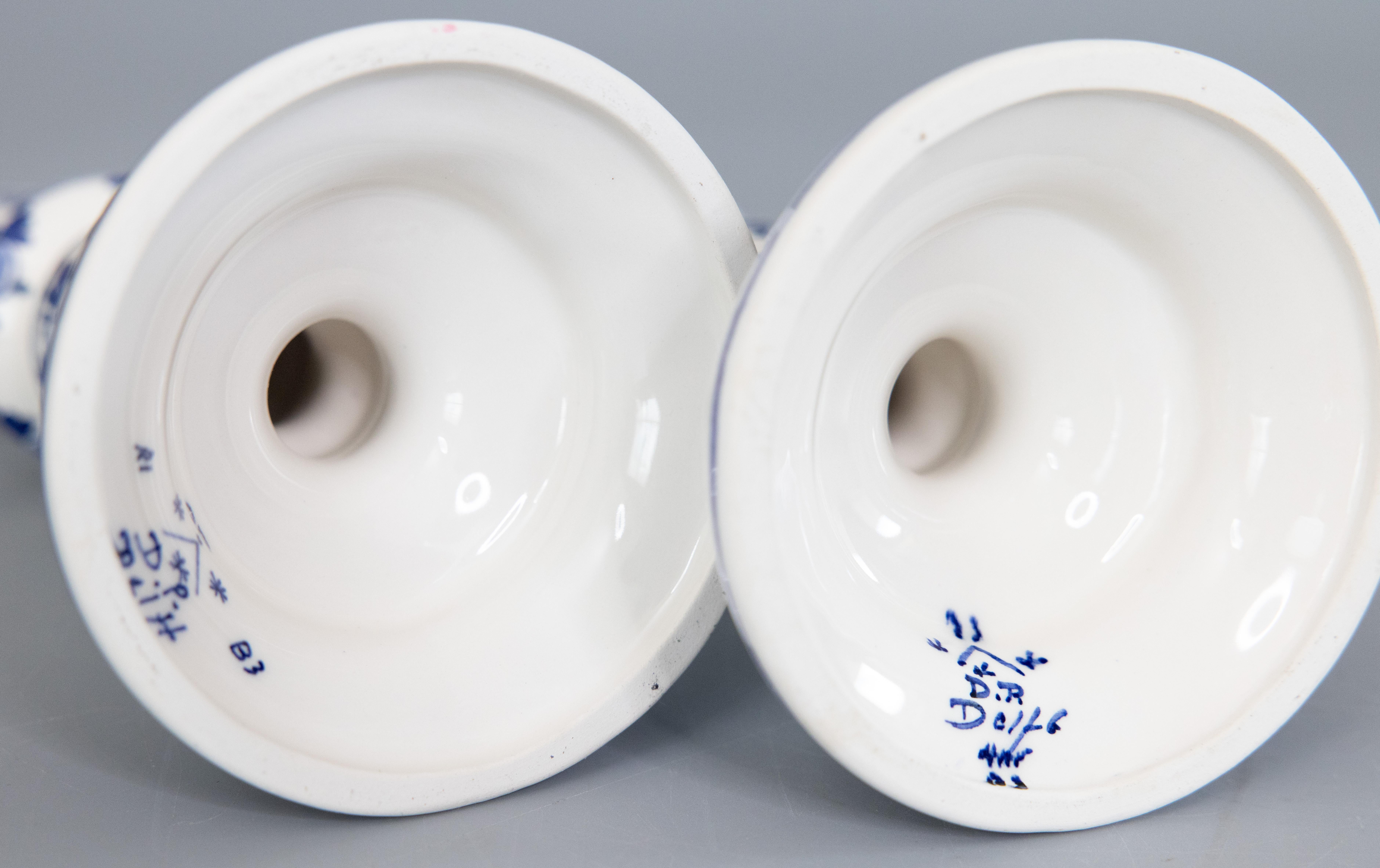 Ceramica Candelieri floreali olandesi di Delft d'epoca - una coppia in vendita
