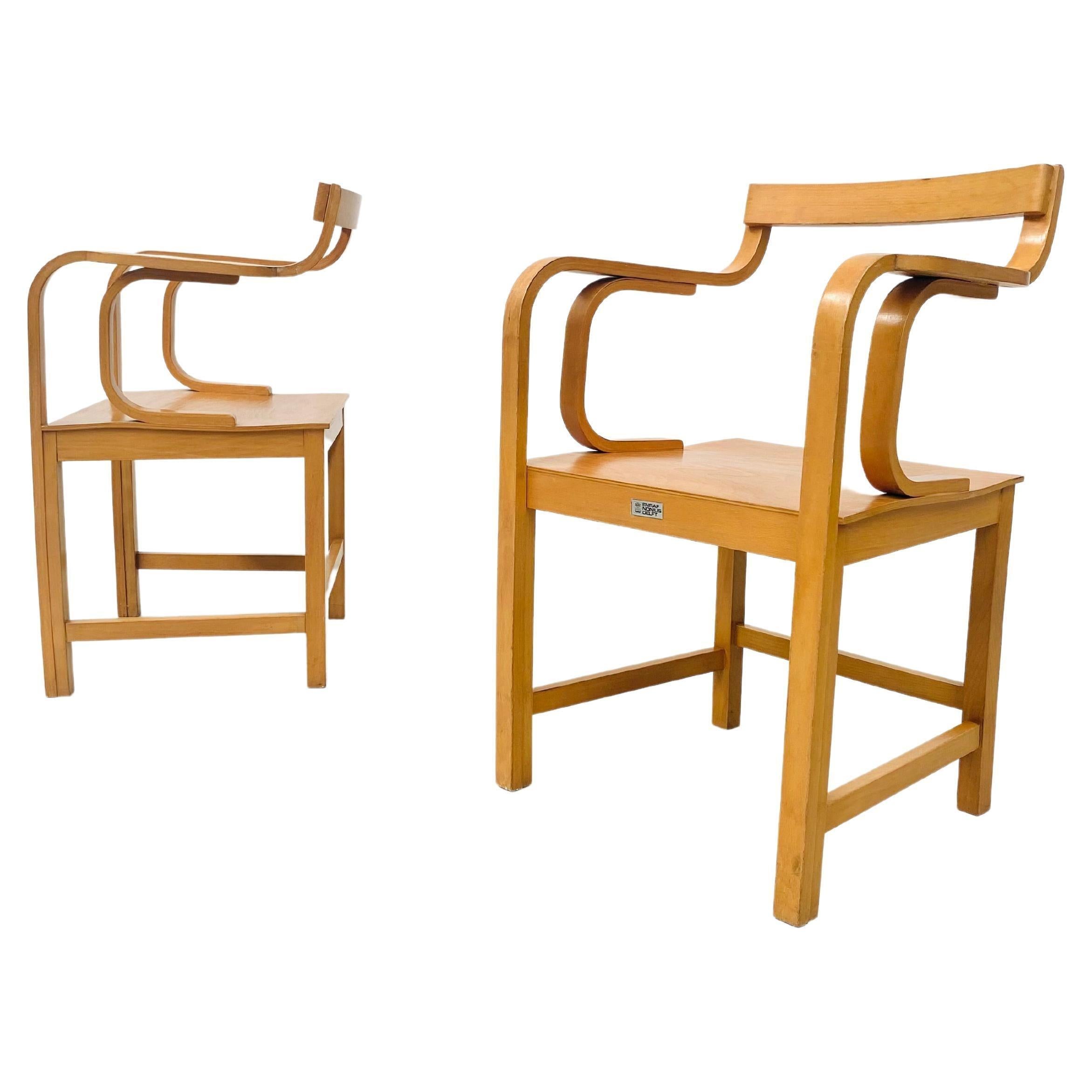 These 2 Dutch designed chairs were designed produced by Enraf Nonius in Delft, the Netherlands. The chairs are made of beech plywood and no screw or nail has been used in the design. The design is inspired by the Scandinavian Modern style in the