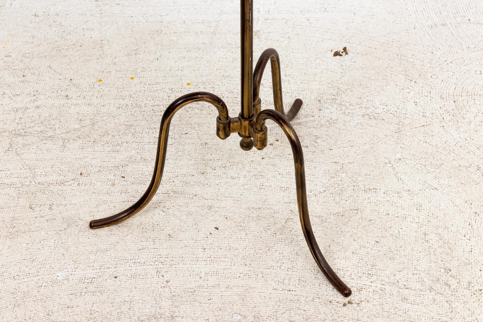 Vintage Dutch side table with mirrored tabletop, metal gallery trim, and tripod pedestal base on scrolled feet. Please note of wear consistent with age including patina and minor oxidation.