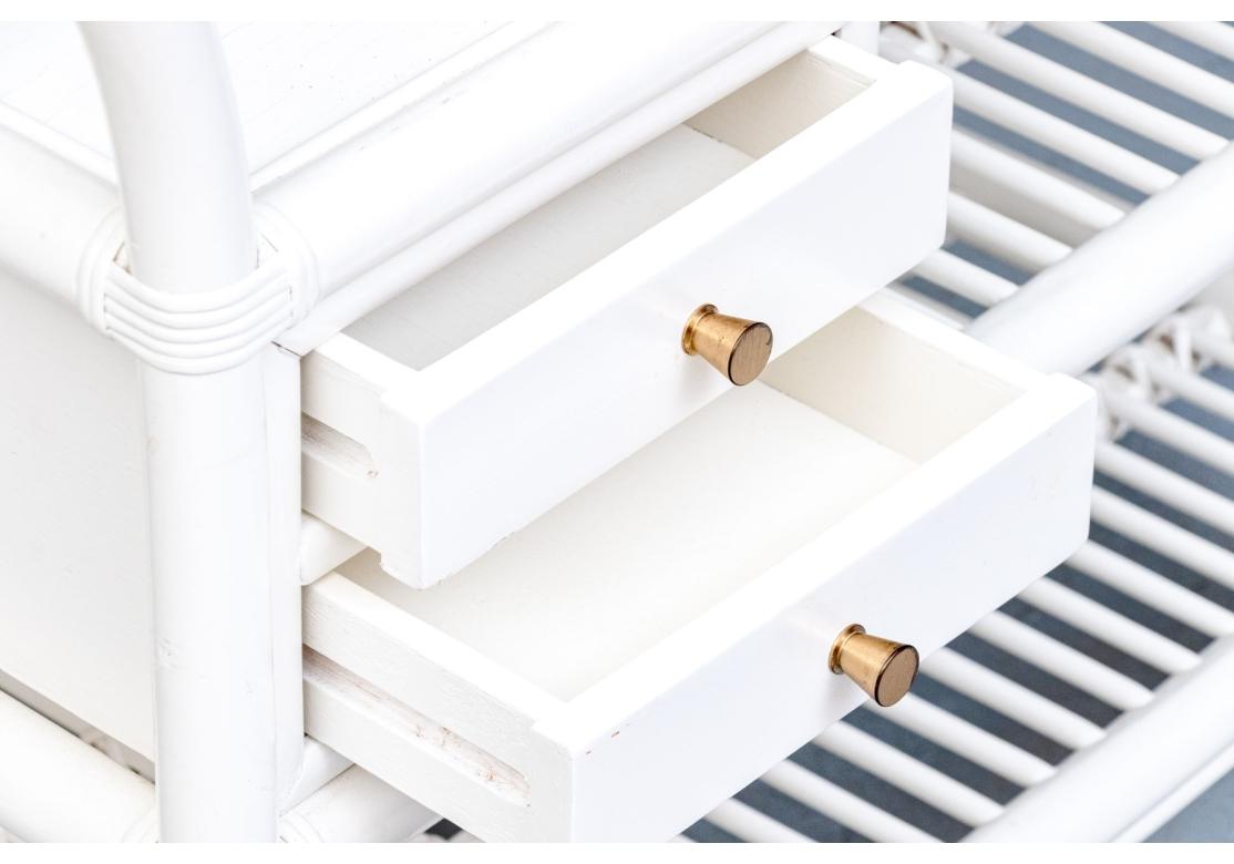 White paint decorated serving trolley constructed from bamboo and rattan attributed to Kenneth Bergenblad, part of the 