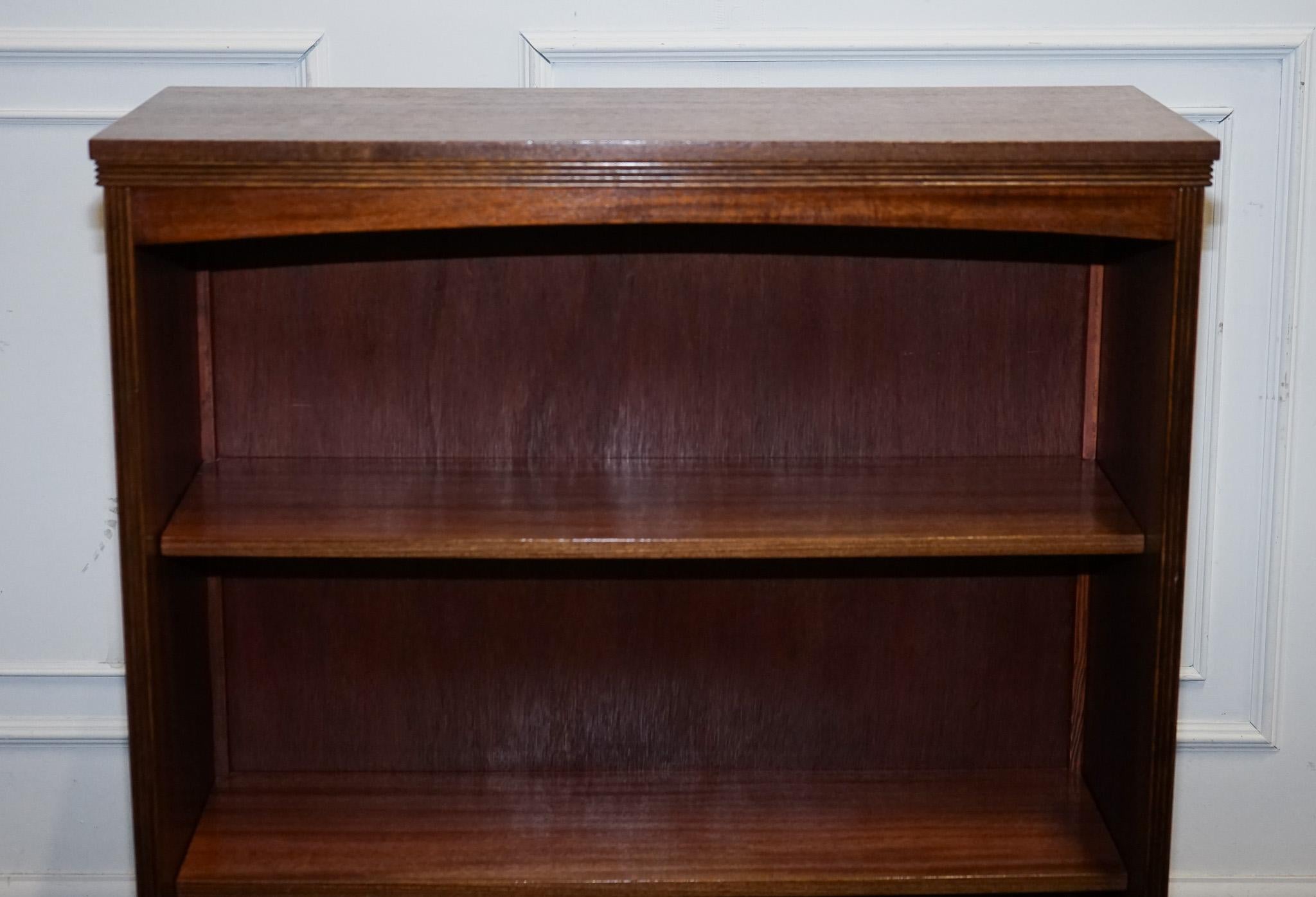 British VINTAGE DWARF OPEN BOOKCASE WiTH FIXED SHELVES For Sale
