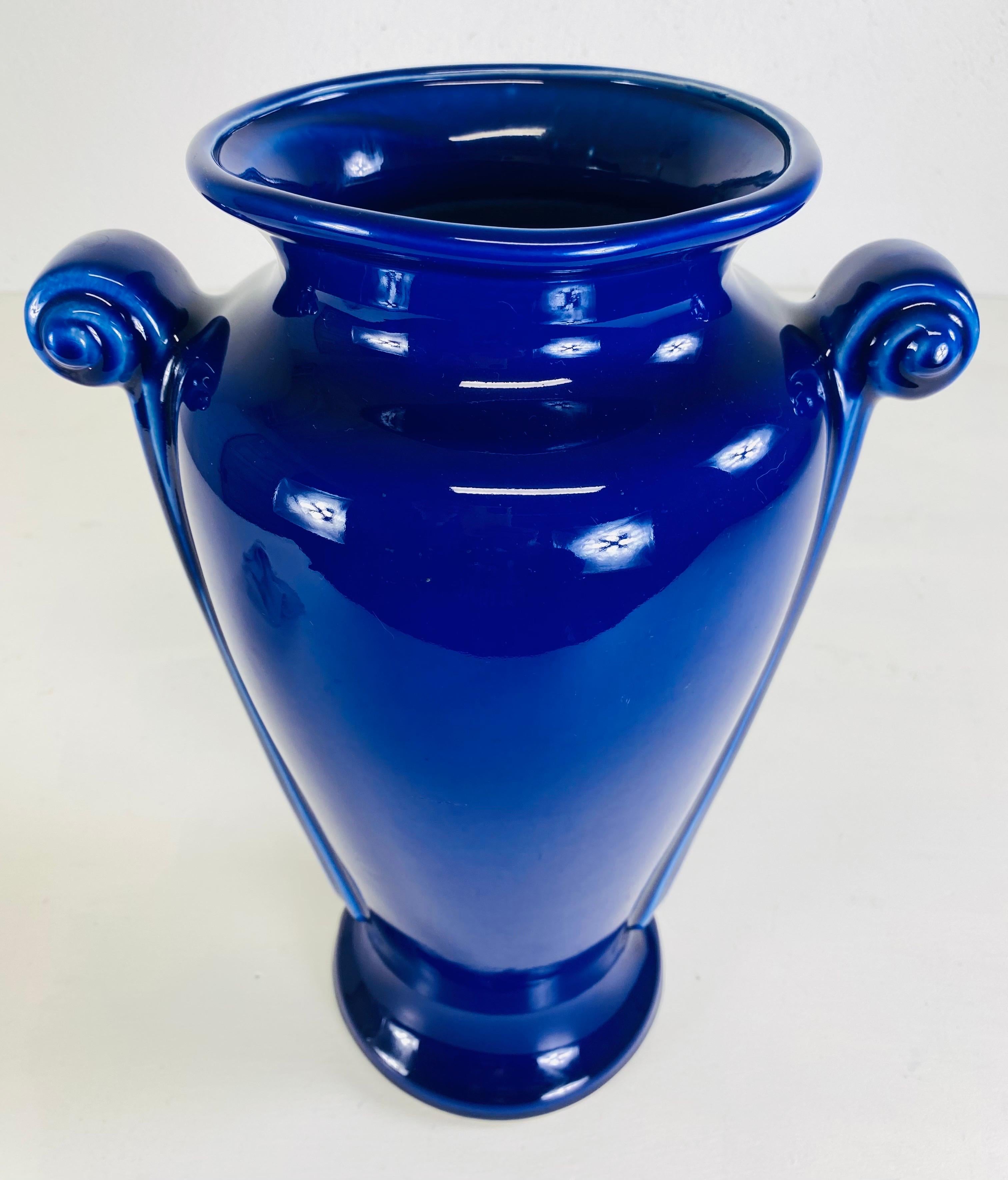 Late 20th Century Vintage dynamic cobalt blue art deco style pottery vase. For Sale