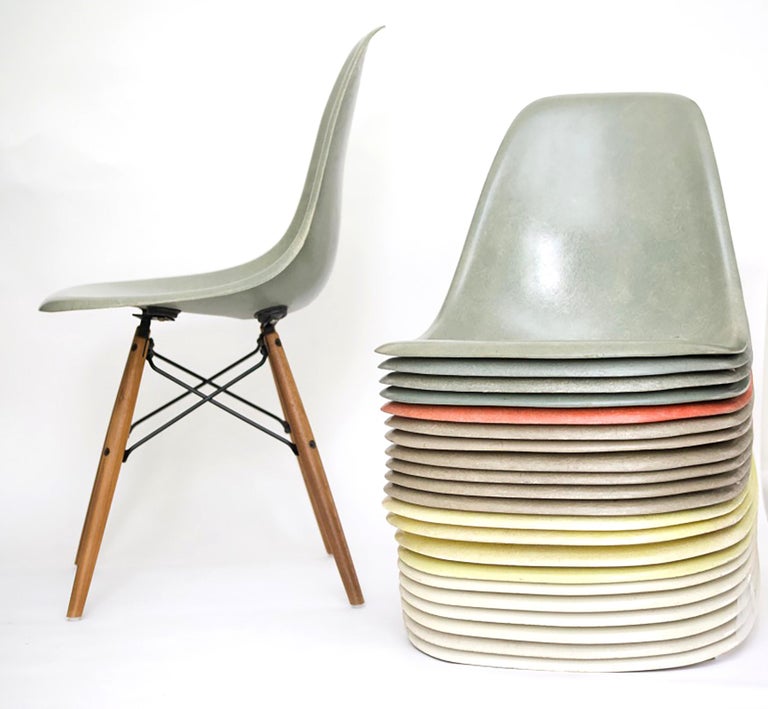 Vintage fiberglass chairs by Eames for Herman Miller on reproduction dowel leg bases or stacking bases. Available inventory and prices change frequently. To purchase, please contact us and provide requested, color, quantity and base style. We will