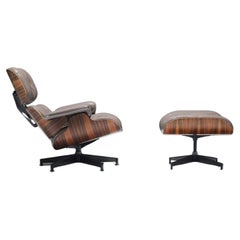 Sedia da salotto e pouf Eames d'epoca di Charles and Ray Eames per Herman Miller