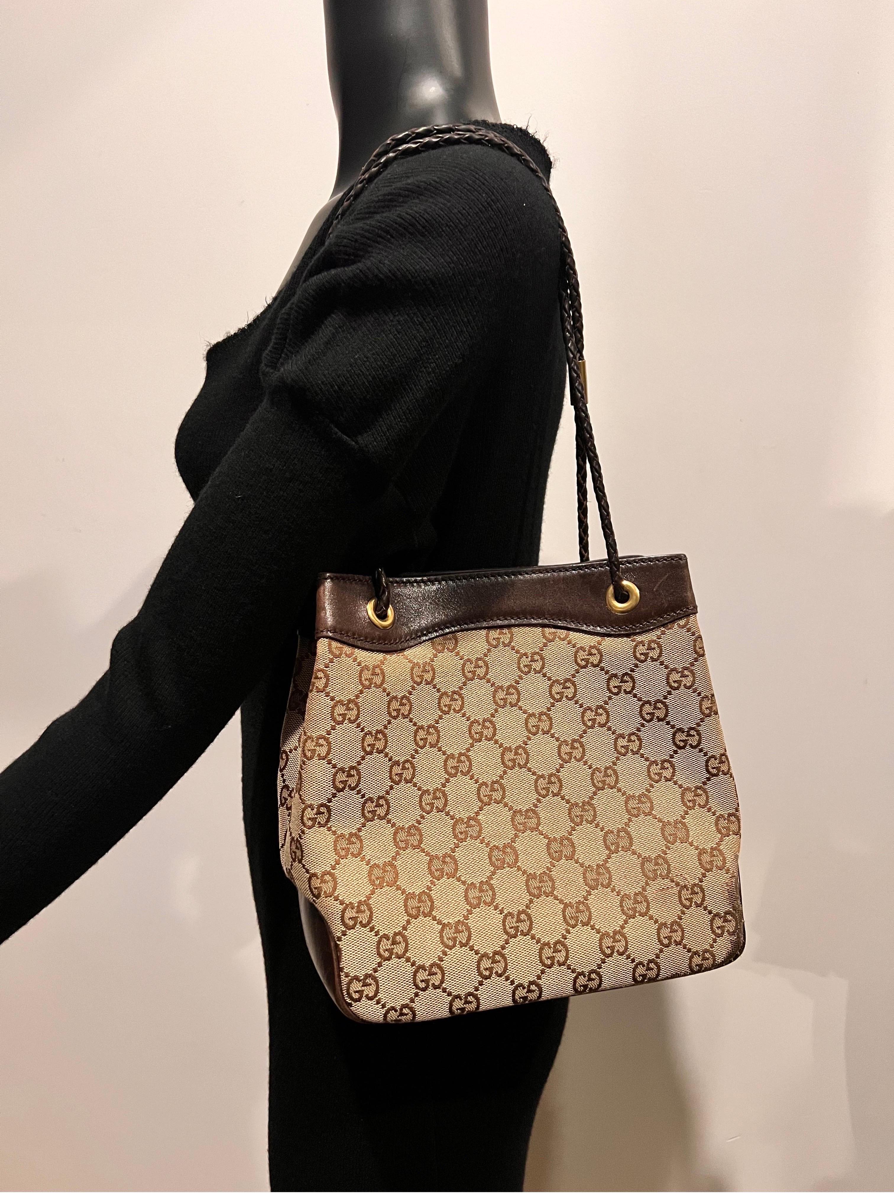 Vintage early 2000’s monogram print GG GUCCI bucket bag in tan colour. Gold hardware detail 
From this exciting era of GUCCI it epitomises the logo mania that was so the look of it’s time.
COMES WITH DUST BAG AND BOX.
In good vintage condition with