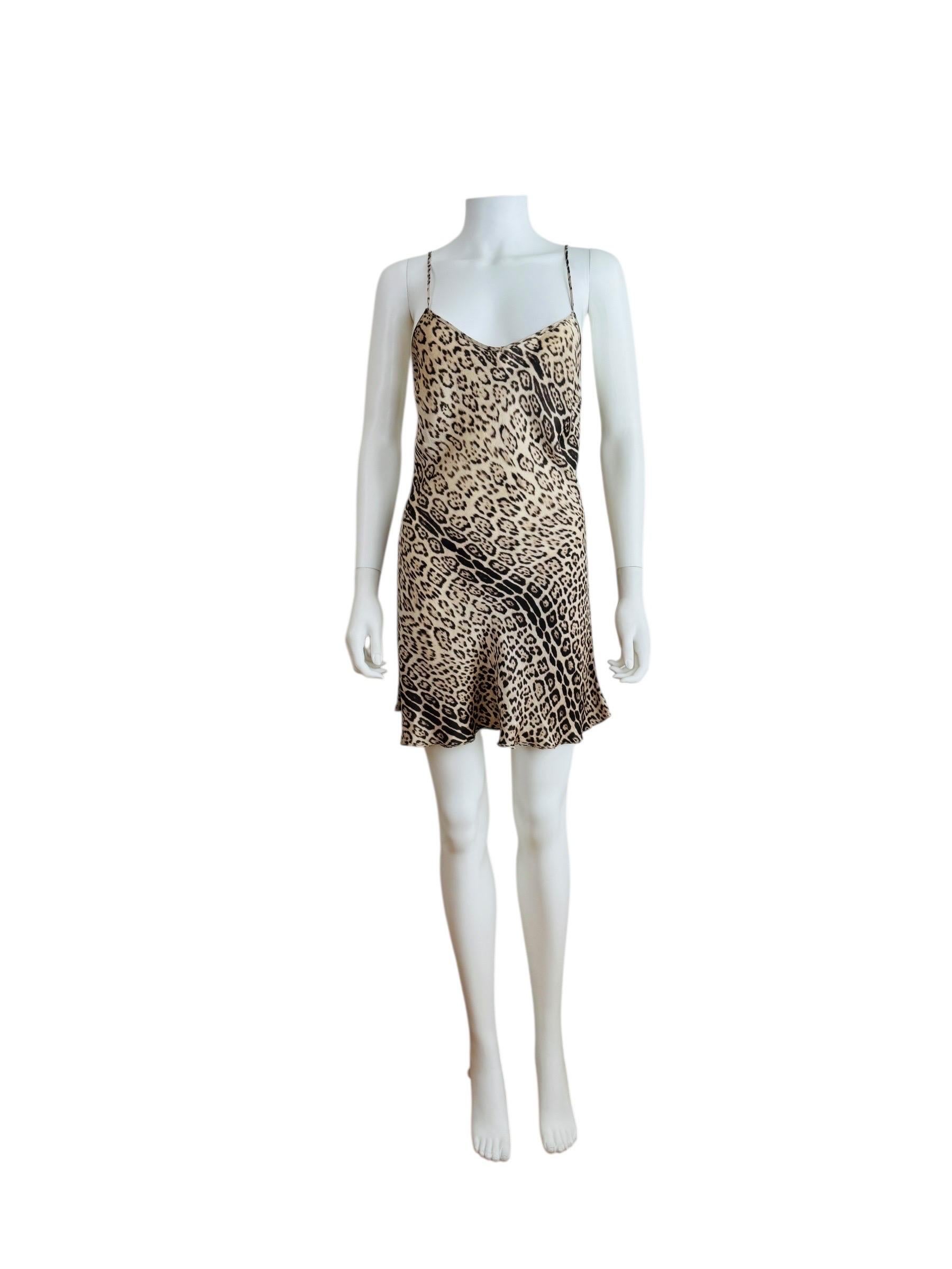 Vintage 2000s Roberto Cavalli dress
Leopard print tissue silk fabric
V neckline
Thin shoulder straps
Mini length
Unlined
Slips on overhead

Size not marked, fits like a 42-44, Measurements - Bust 17-19 