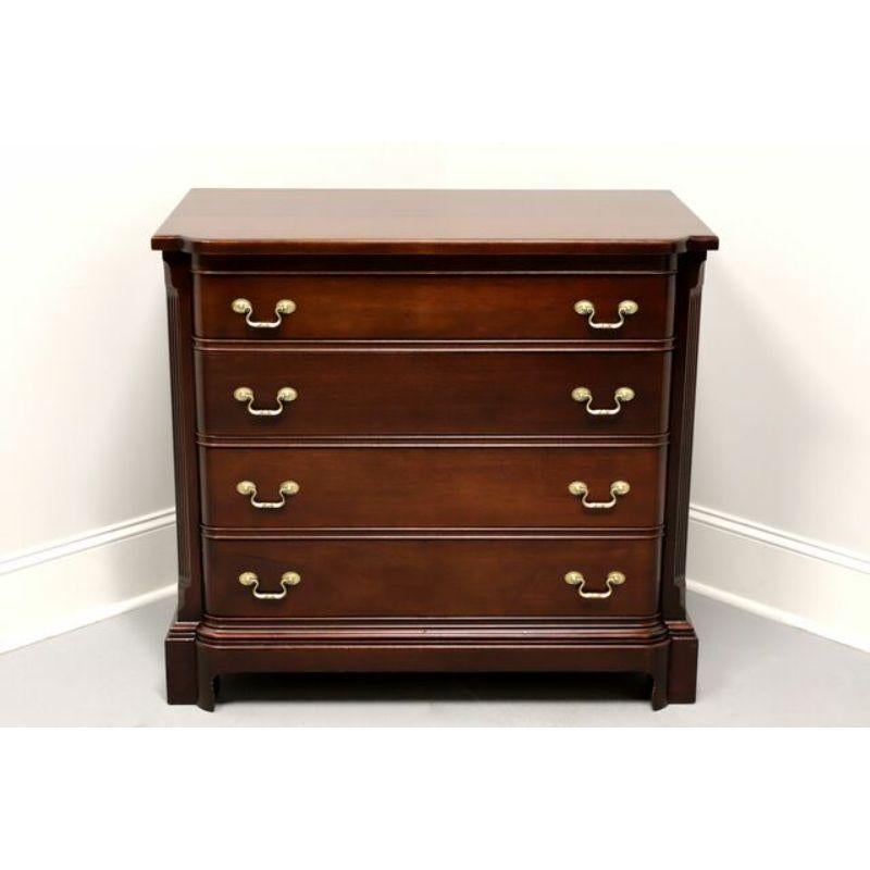 A bachelor chest in the Georgian style by Georgetown Galleries. Solid mahogany with brass hardware. Features a bowed front, fluted column sides and four dovetail drawers. Made in the Huntington, West Virginia, USA, in the mid 20th Century.

Style #: