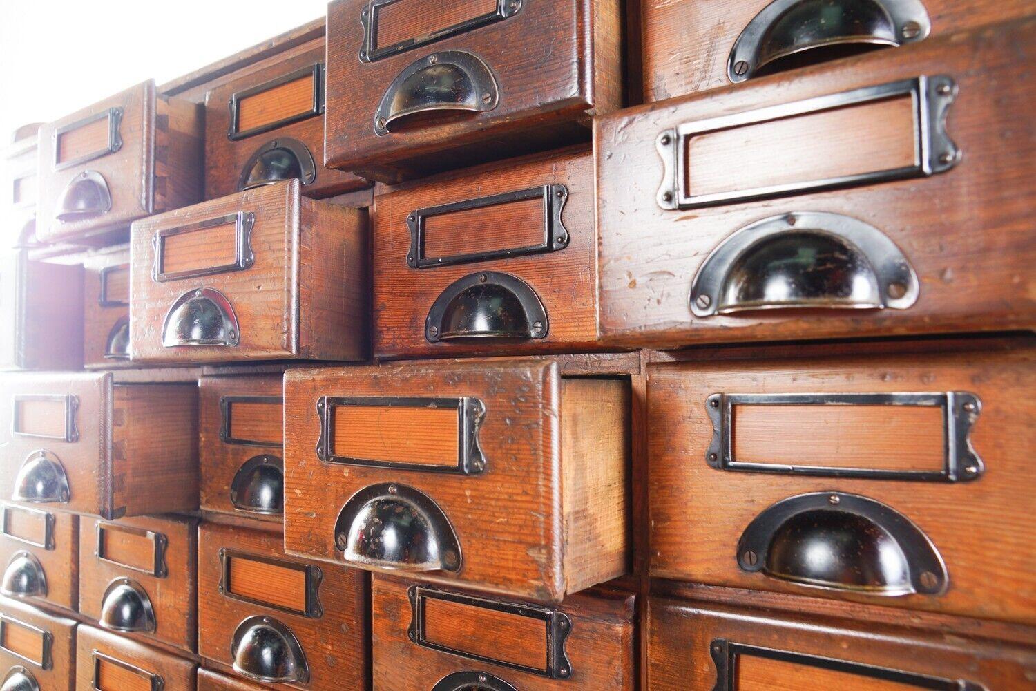 Vintage Early 20th Century Haberdashery or Office Organiser Bank of Drawers

A large, stained pine haberdashery or office drawer unit that splits into two, 
which was produced in the early 20th century, and will serve as a talking point wherever it