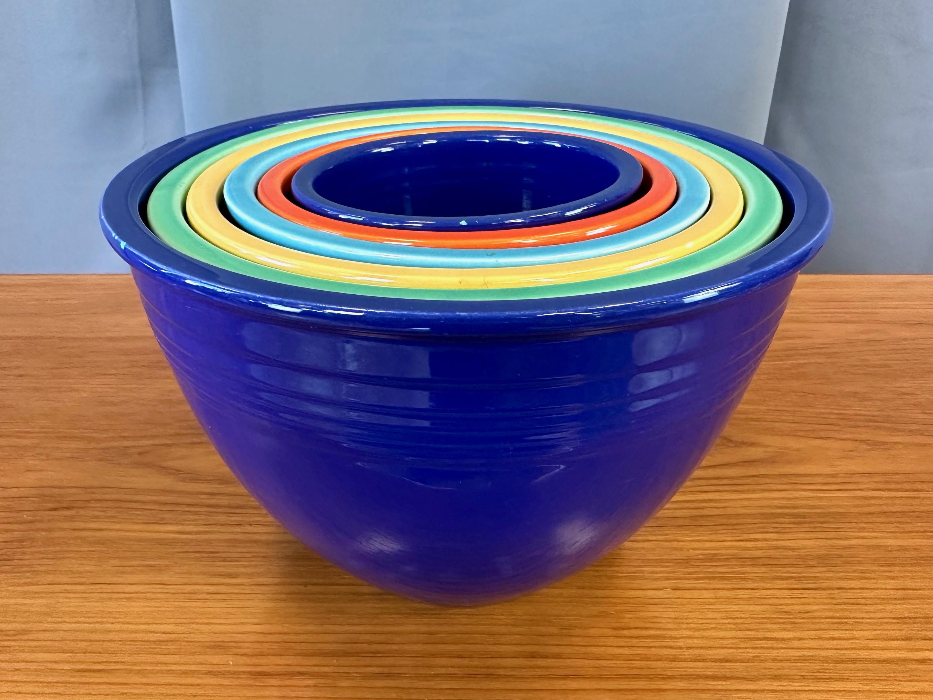 A delightfully colorful circa 1940 six-piece set of early production Fiesta—commonly known as Fiestaware—nesting mixing bowls by the Homer Laughlin Company of West Virginia.

Features a rainbow-like array of original colors introduced in the