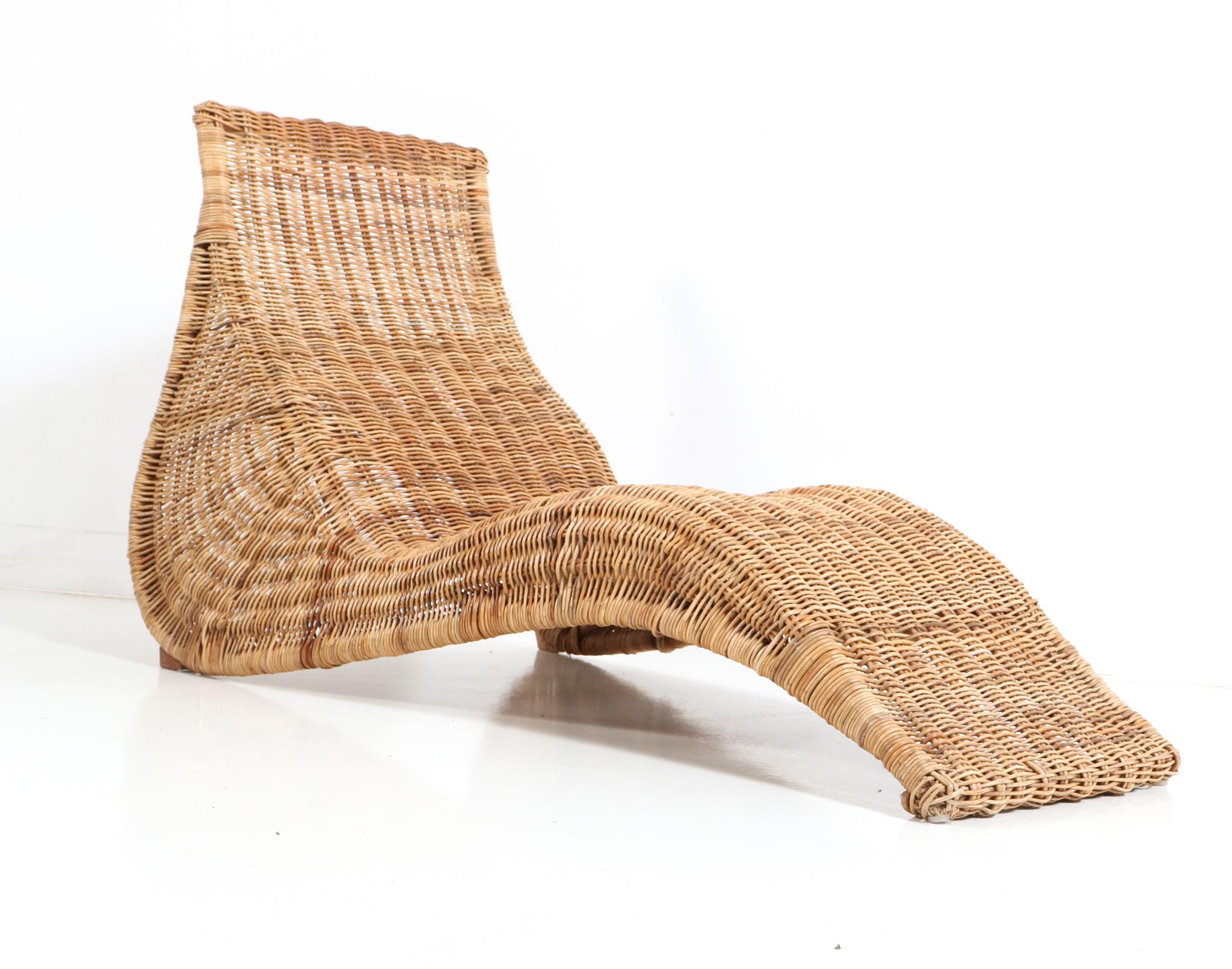 Stunning Mid-Century Modern style chaise longue or lounge chair.
Design by Carl Öjerstam for Ikea.
Striking Swedish design from the 1990s.
Executed in wicker and rattan, an idyllic place to relax and perfect for reading a book in peace fully
