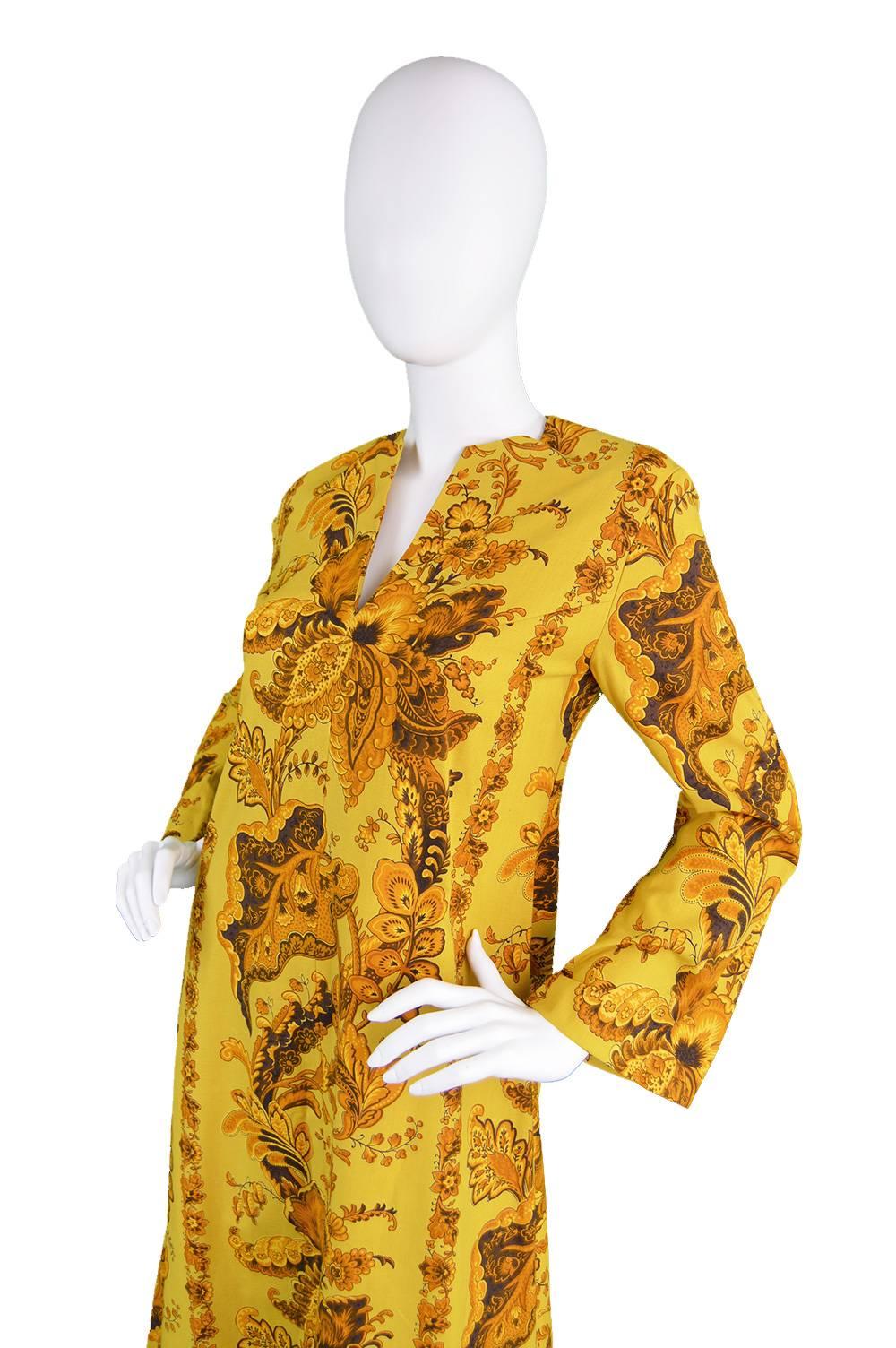 An absolutely stunning vintage women's caftan dress from the late 60s by genius and iconic British vintage fashion designer, Janice Wainwright, for Simon Massey - before she started her own label in the early 70s. Made with an incredible, vibrantly
