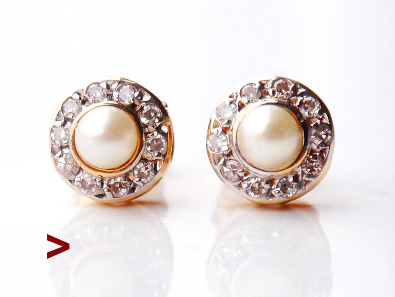 A pair of European Earrings with parts in solid Yellow 18K Gold and Platinum.
Twenty old European diamond cut Diamond stones ca. 0.01 ct each / 0.2ctw. All diamonds with open backs. Color ca. ca. G,H /VS. Pearls Ø 3.2 mm each.

Each floret is Ø 6.5
