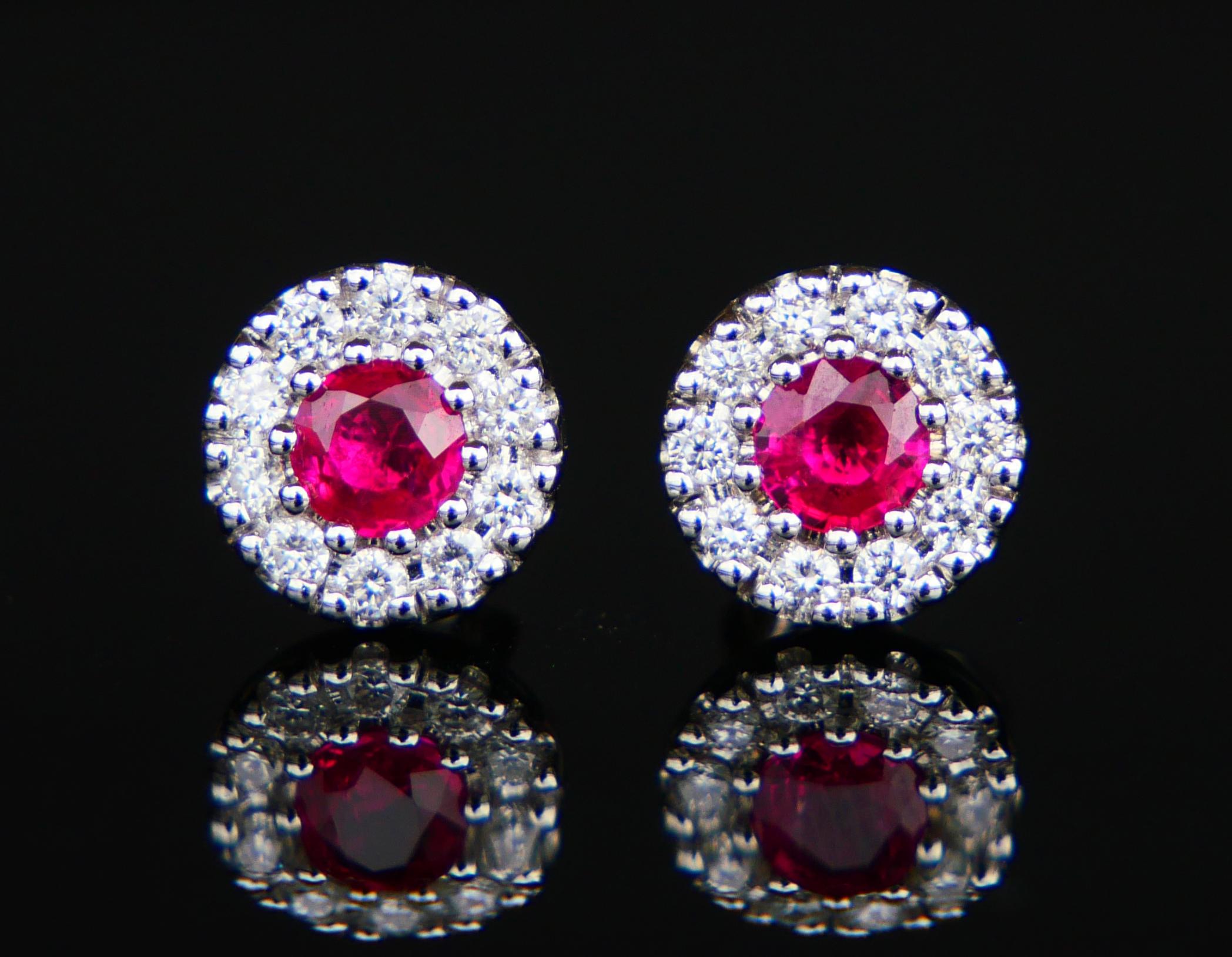 A pair of fine vintage European flower halo studs in solid 18K White Gold .

Hand-made ca. the 1960s -1970s. Hallmarks : maker's initials, 750/ 18K.

Each floret Ø 7mm. Two natural rosy Red Rubies diamond cut Ø 3.75 mm / ca. 0.25 ct each, both