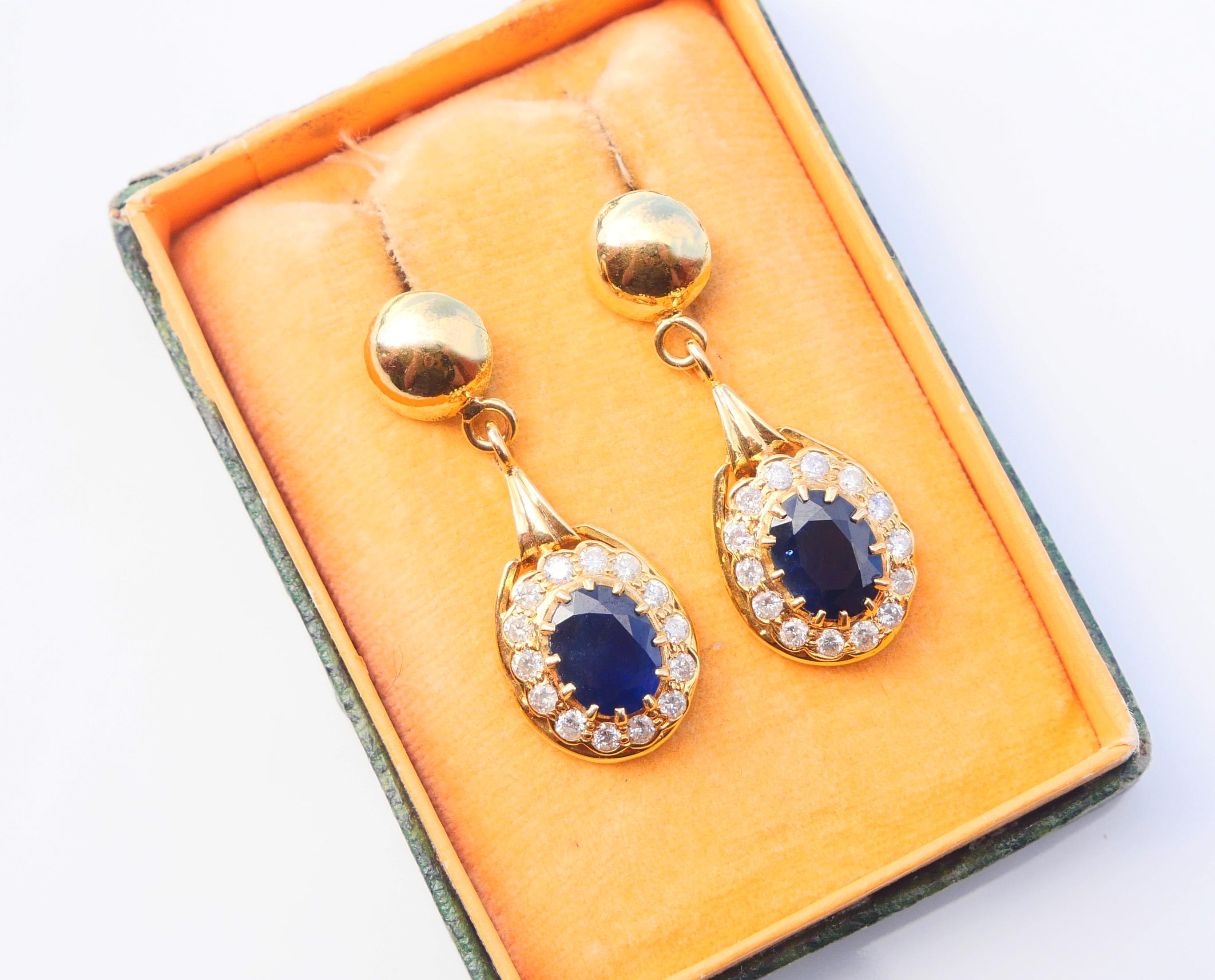 A pair of fine European dangles  in solid 18K Yellow Gold decorated with oval cut natural Blue Sapphires 9 mm x 7 mm x 4.25 mm deep / ca 2.25ct each and total of 28 natural old European cut Diamonds Ø 2 mm / ca. 0.04 ct each or 1.12 ct total weight.