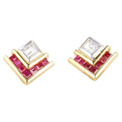 Vintage earrings with emerald-cut diamonds and calibrated rubies Vintage earrings with emerald-cut diamonds and calibrated rubies
