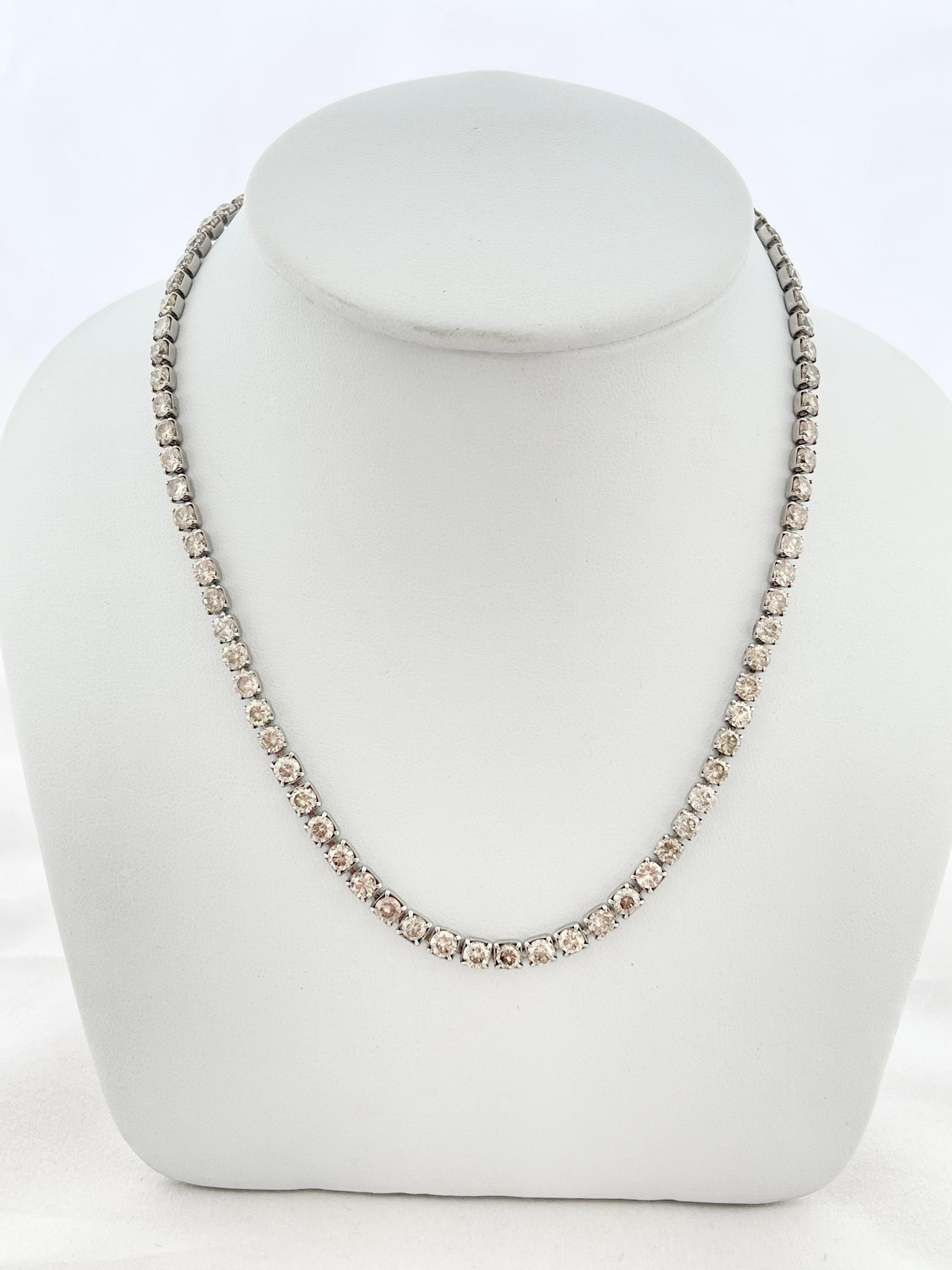 This vintage necklace is a stunning piece of fine jewellery, crafted in 850 platinum and featuring 20 carats of earth mined diamonds. 

The classic tennis style is currently on-trend but it also makes it a timeless piece that will never go out of