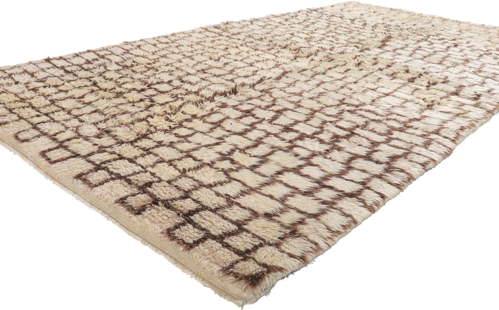 52713 Vintage Moroccan Azilal Rug, 04'07 x 08'08. This hand-knotted wool vintage Moroccan Azilal rug embodies the essence of Organic Modern design, seamlessly blending natural elements with contemporary aesthetics. The Azilal rug's grid pattern,