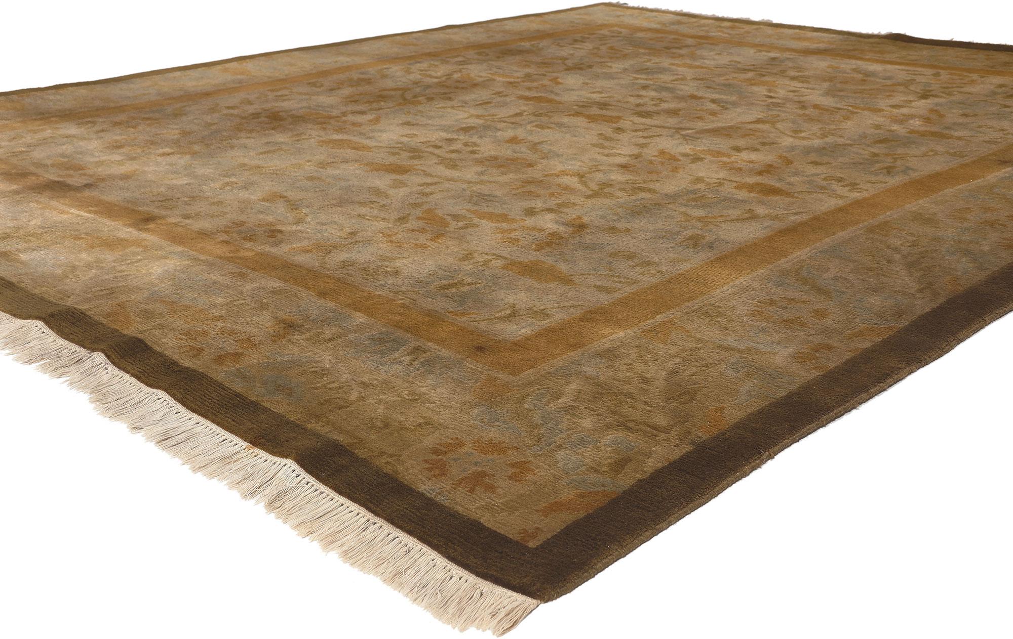 76612 Vintage Earthy Tibetan Rug, 07'05 x 09'03. Biophilic Design meets earth-tone elegance in this vintage Tibetan rug. The naturalistic forms and earthy hues woven into this piece work together creating a warm and cozy look. An allover pattern