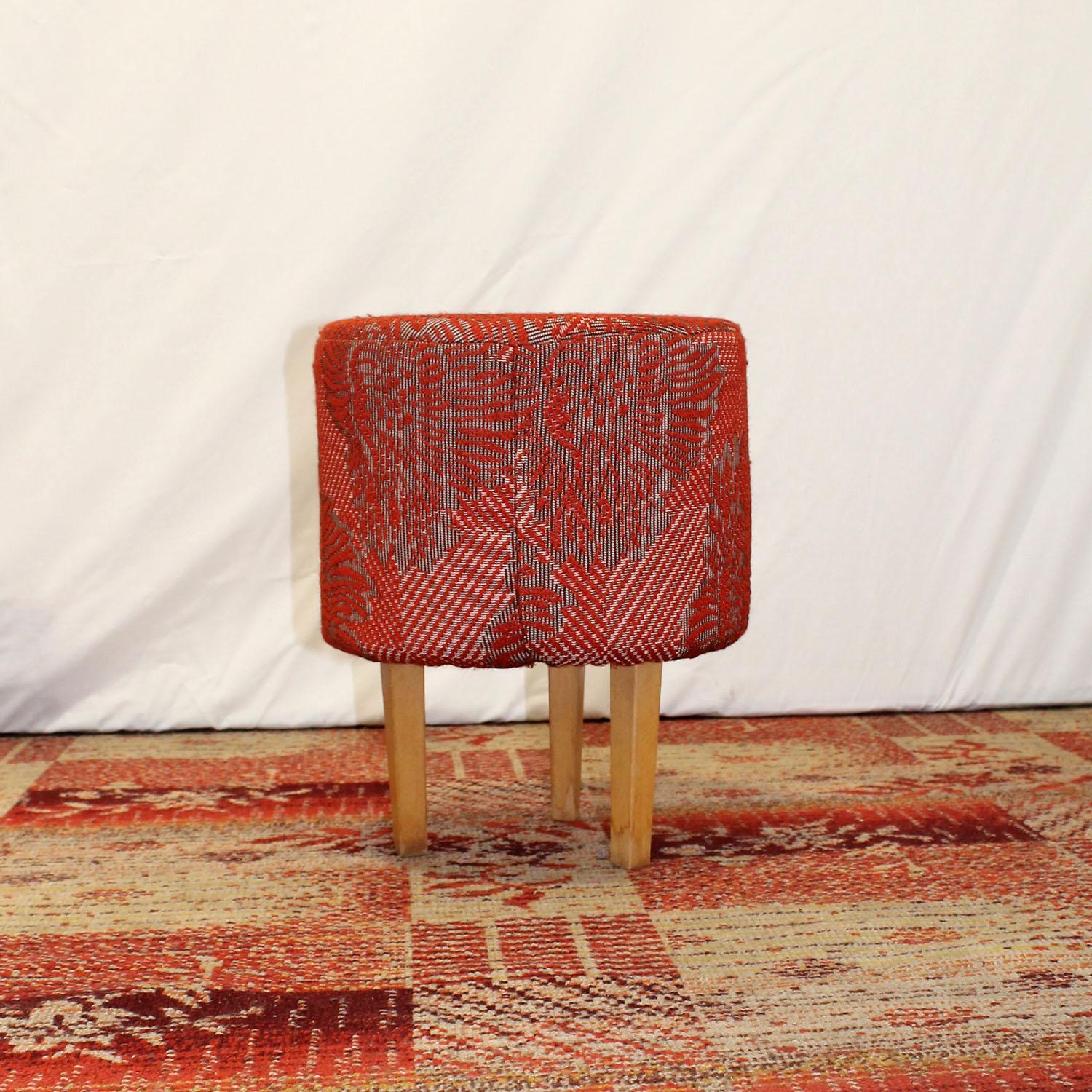 This pouffe- footstool was made in the former Czechoslovakia in the 1970s.
A very comfortable retro chic. It´s made of beech wood and fabric. 
In good Vintage condition, showing slight signs of age and using.

Dimensions: 34 x 43 x 34 cm (Width