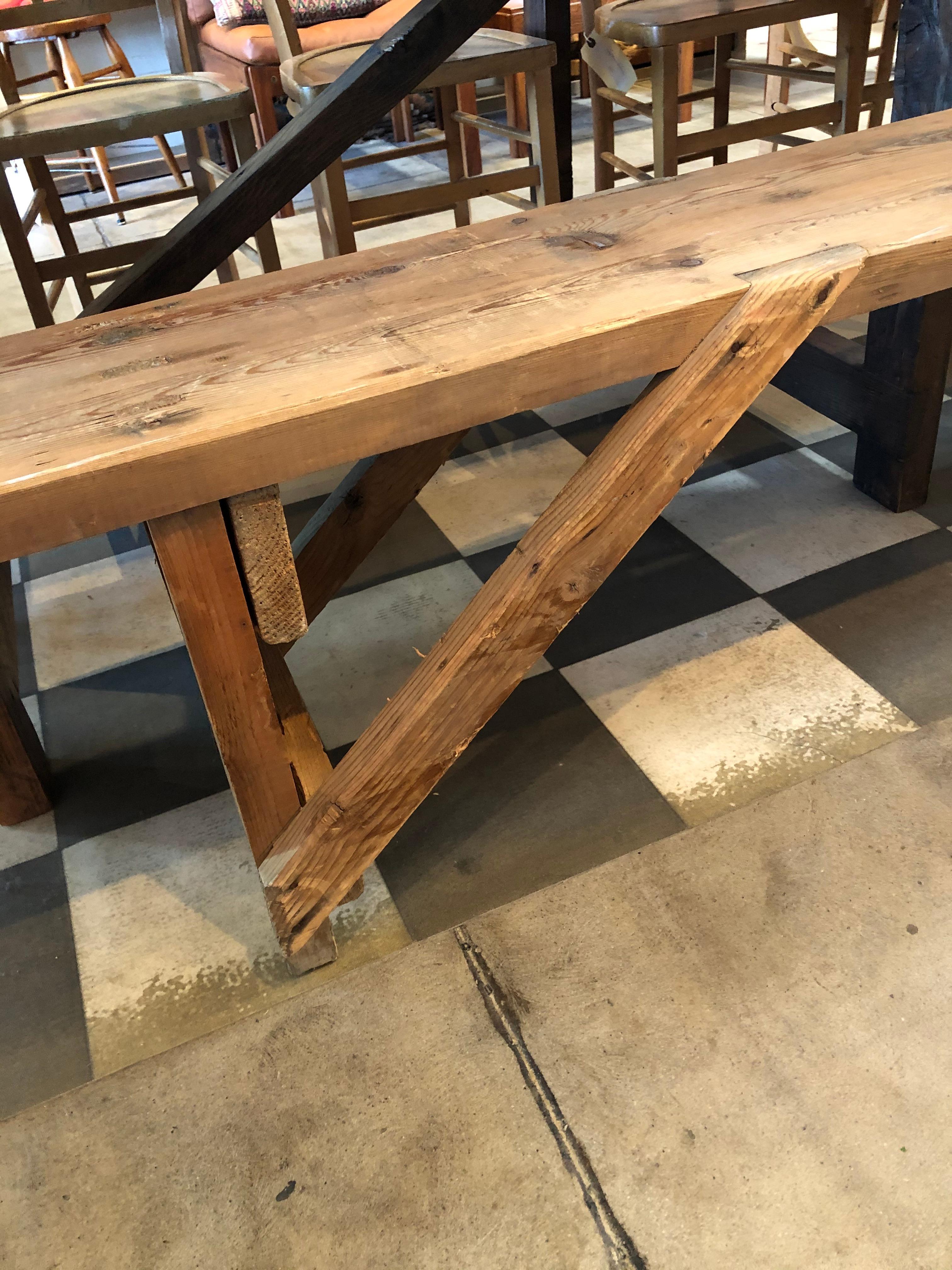 Vintage European bench that would be styled nicely with a farmhouse table, against wall in an entry way, garden space and so on! Wood is a natural color showing the natural grain in the planks.