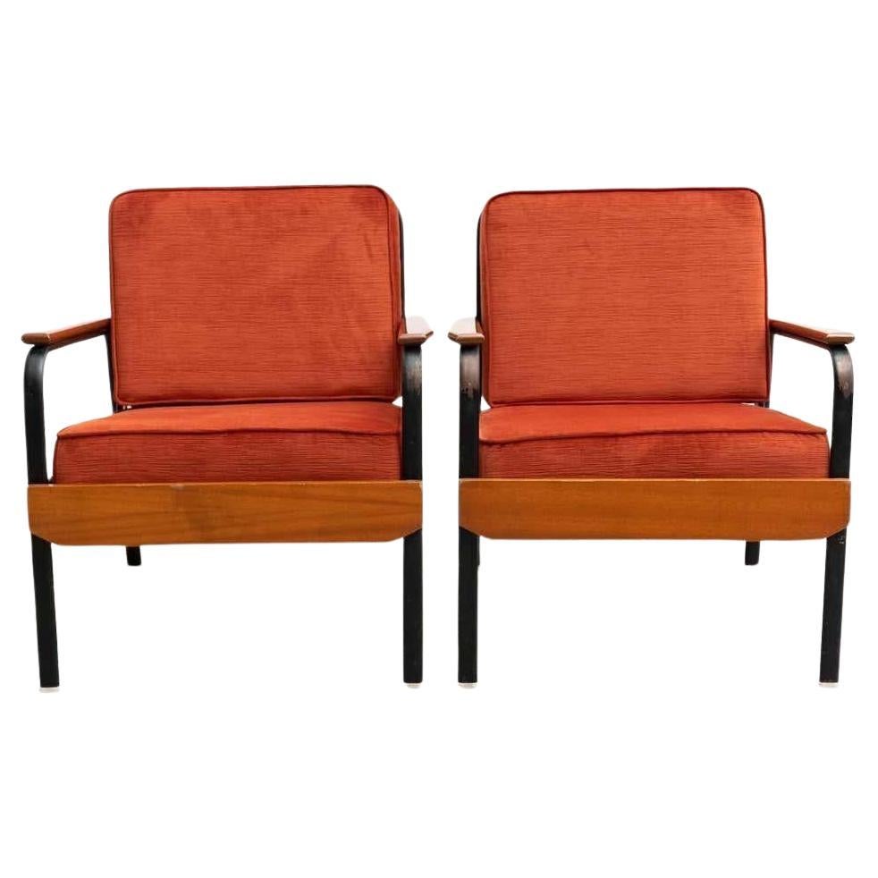 Vintage-Sessel aus den 1950er Jahren im Stil von Jean Prouvé - 2er-Set

Tauchen Sie ein in die Welt des modernen Designs der Jahrhundertmitte mit diesem exquisiten Set aus zwei Easy Chairs, die um 1950 in Frankreich hergestellt und im ikonischen