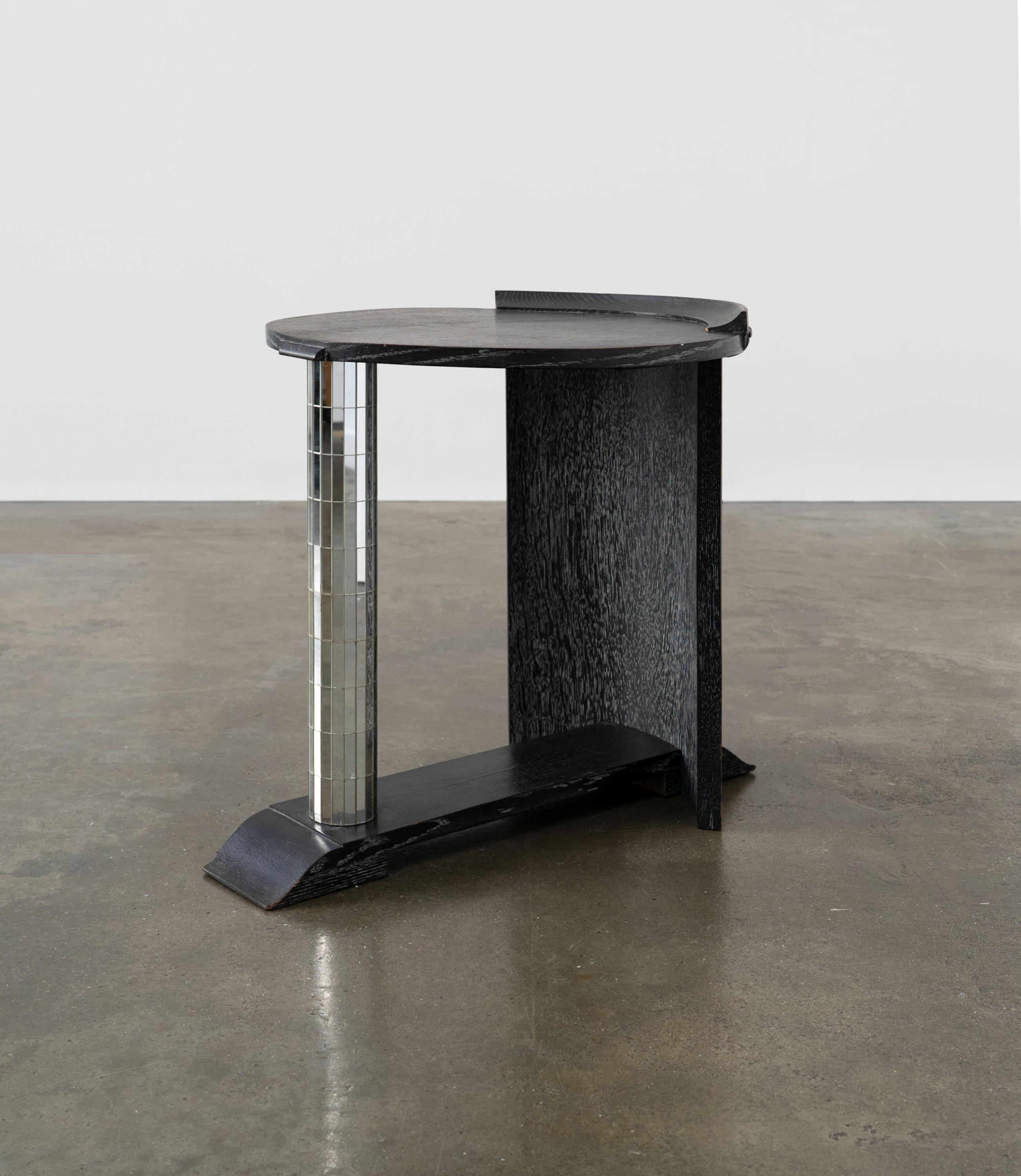 A very good and unusual 20th Century pedestal table, made from ebonised and limed oak and featuring a mosaic mirror tiled column.
It is a well made piece that is part of a collection of items from the same unattributed maker/designer. 

Dimensions